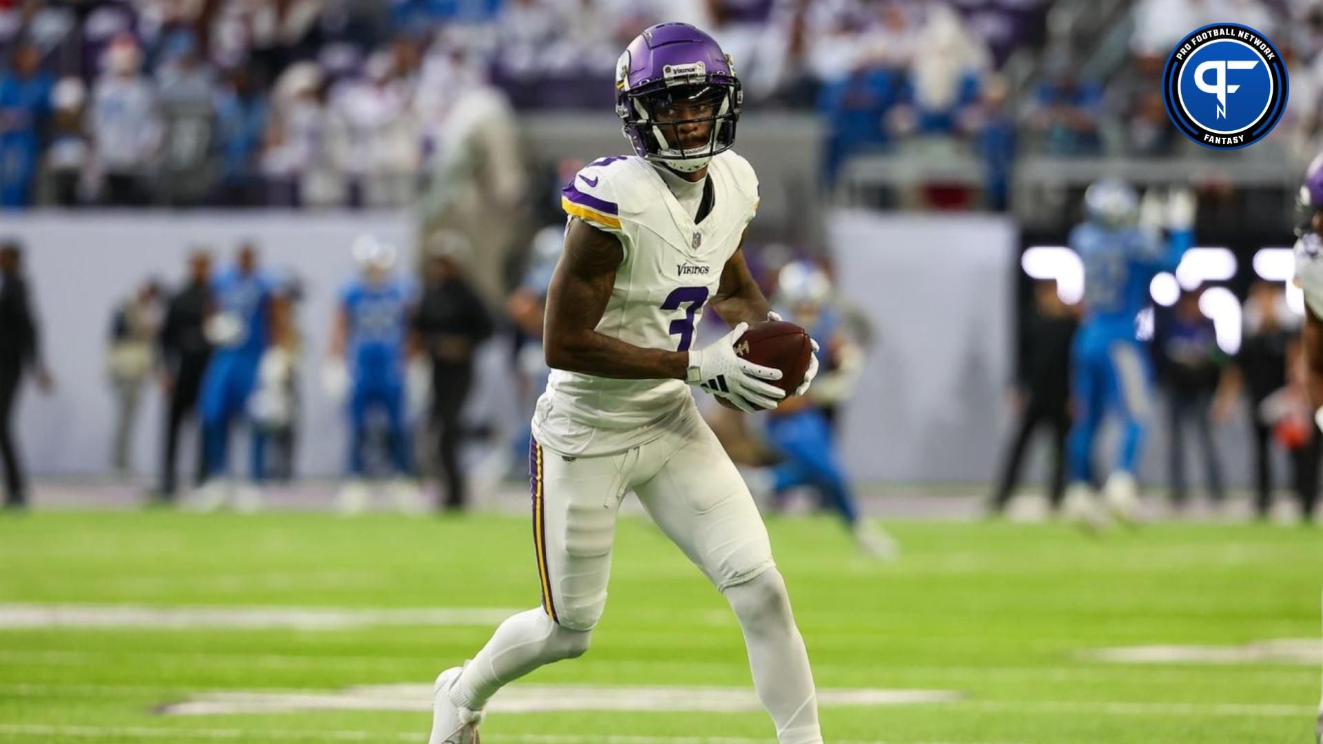 Minnesota Vikings wide receiver Jordan Addison (3) warms up before the game against the Detroit Lions at U.S. Bank Stadium.