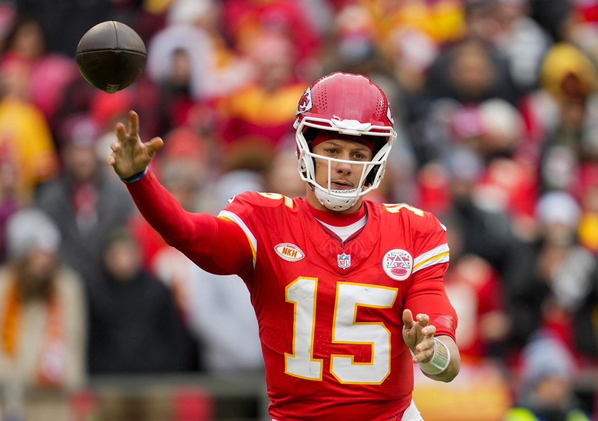 Kansas City Chiefs quarterback Patrick Mahomes (15) throws a pass during the first half against the Las Vegas Raiders at GEHA Field at Arrowhead Stadium.