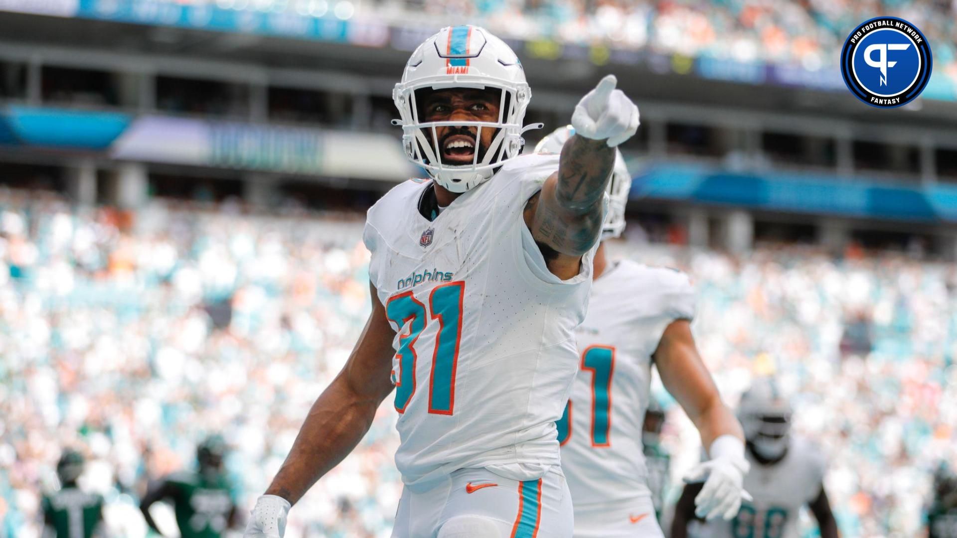 Miami Dolphins running back Raheem Mostert (31) celebrates after scoring a touchdown against the New York Jets during the first quarter at Hard Rock Stadium.