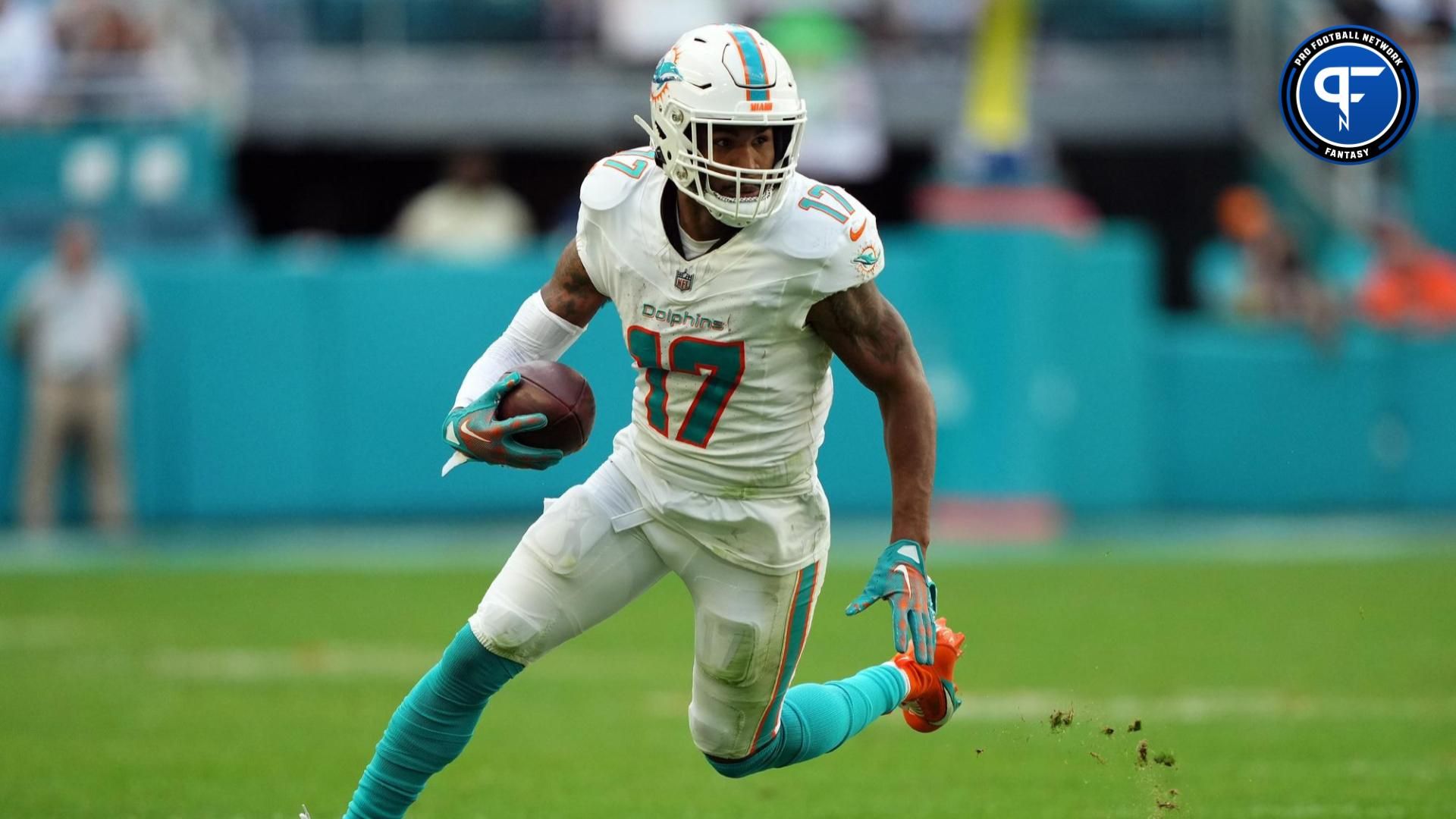 Miami Dolphins wide receiver Jaylen Waddle (17) runs with the ball against the New York Jets during the second half at Hard Rock Stadium.