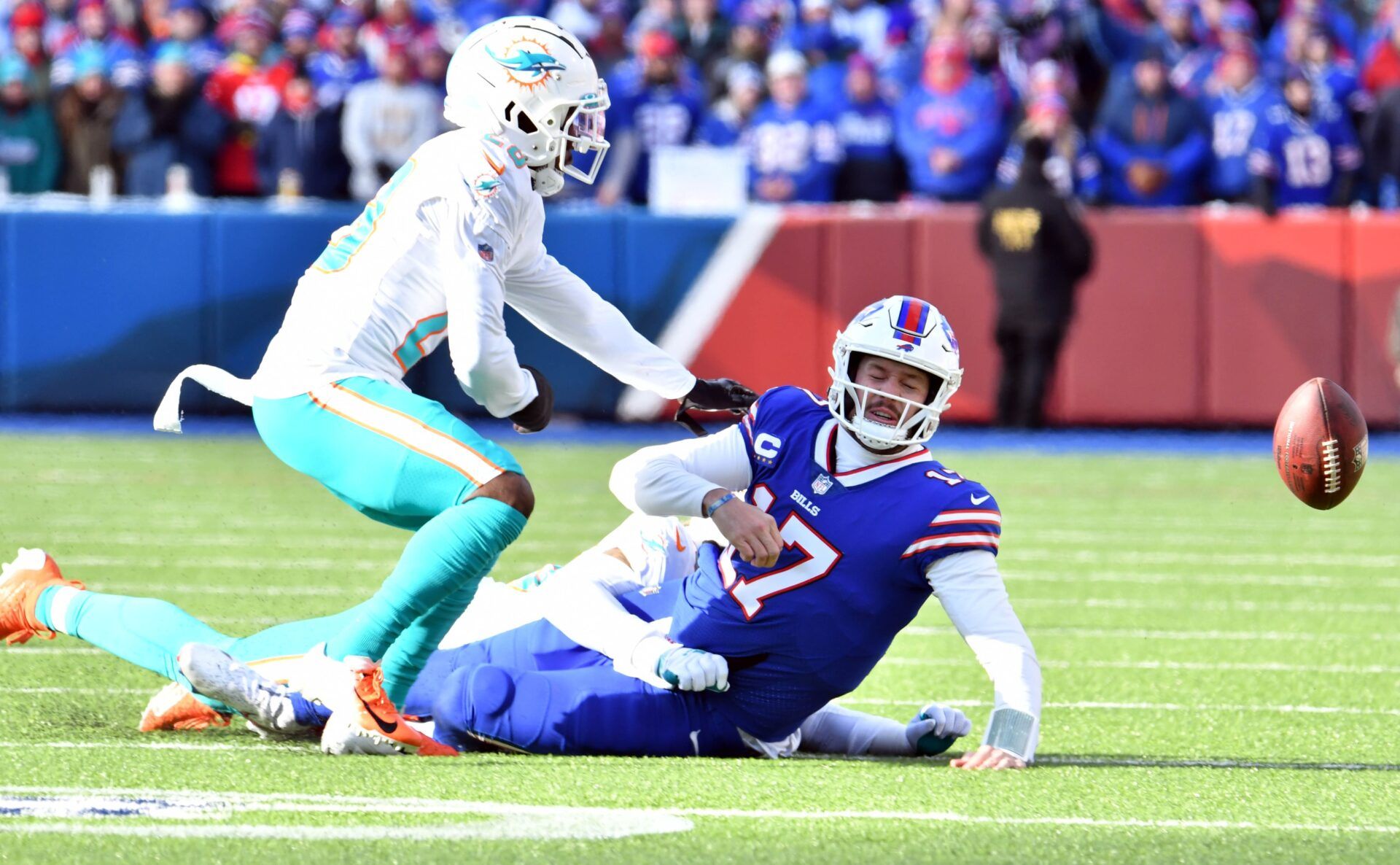 Buffalo Bills QB Josh Allen (17) fumbles against the Miami Dolphins.