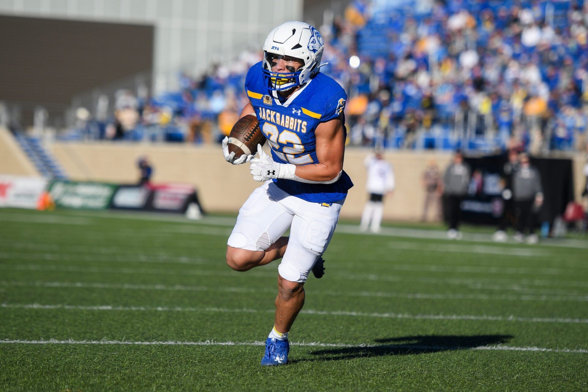 South Dakote State Jackrabbits running back Isaiah Davis (22) runs with the ball.