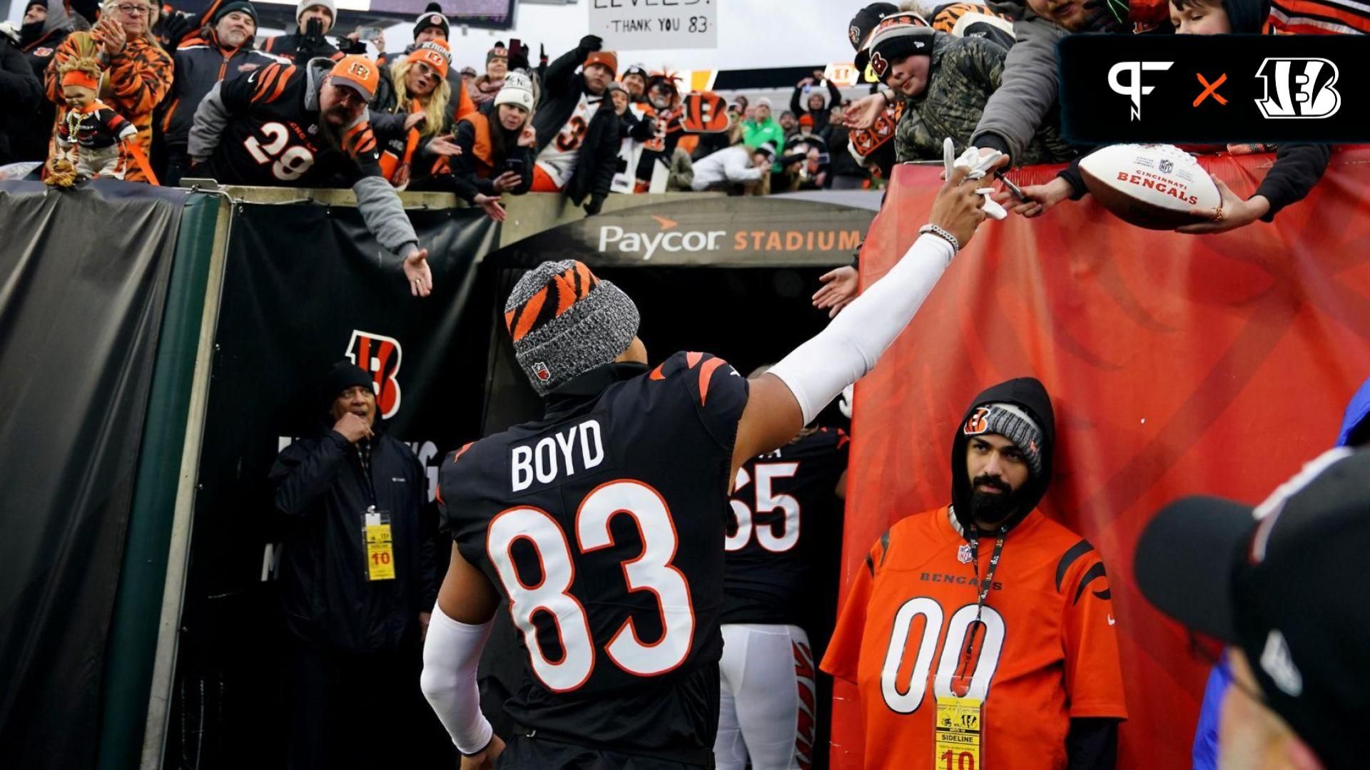 Cincinnati Bengals wide receiver Tyler Boyd (83) hands his gloves to a fan at the conclusion of a Week 18 NFL football game between the Cleveland Browns at Cincinnati Bengals, Sunday, Jan. 7, 2024, at Paycor Stadium in Cincinnati.