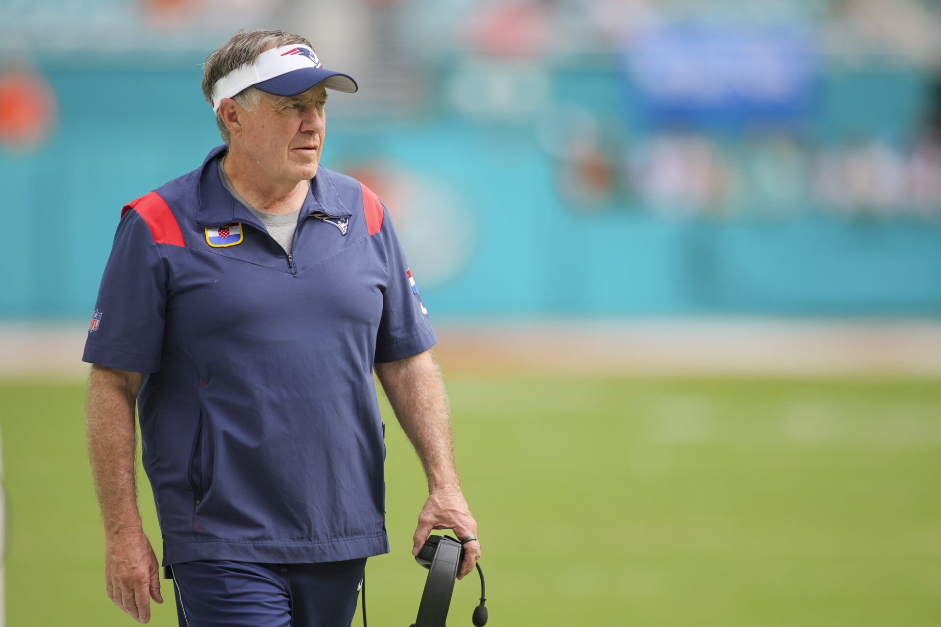 New England Patriots head coach Bill Belichick watches from the sideline against the Miami Dolphins during the fourth quarter at Hard Rock Stadium.