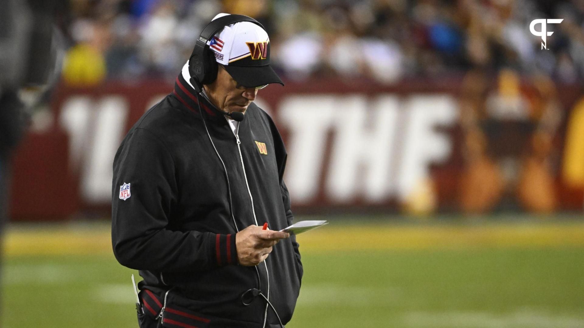 Washington Commanders head coach Ron Rivera looks on against the Dallas Cowboys during the first half at FedExField.