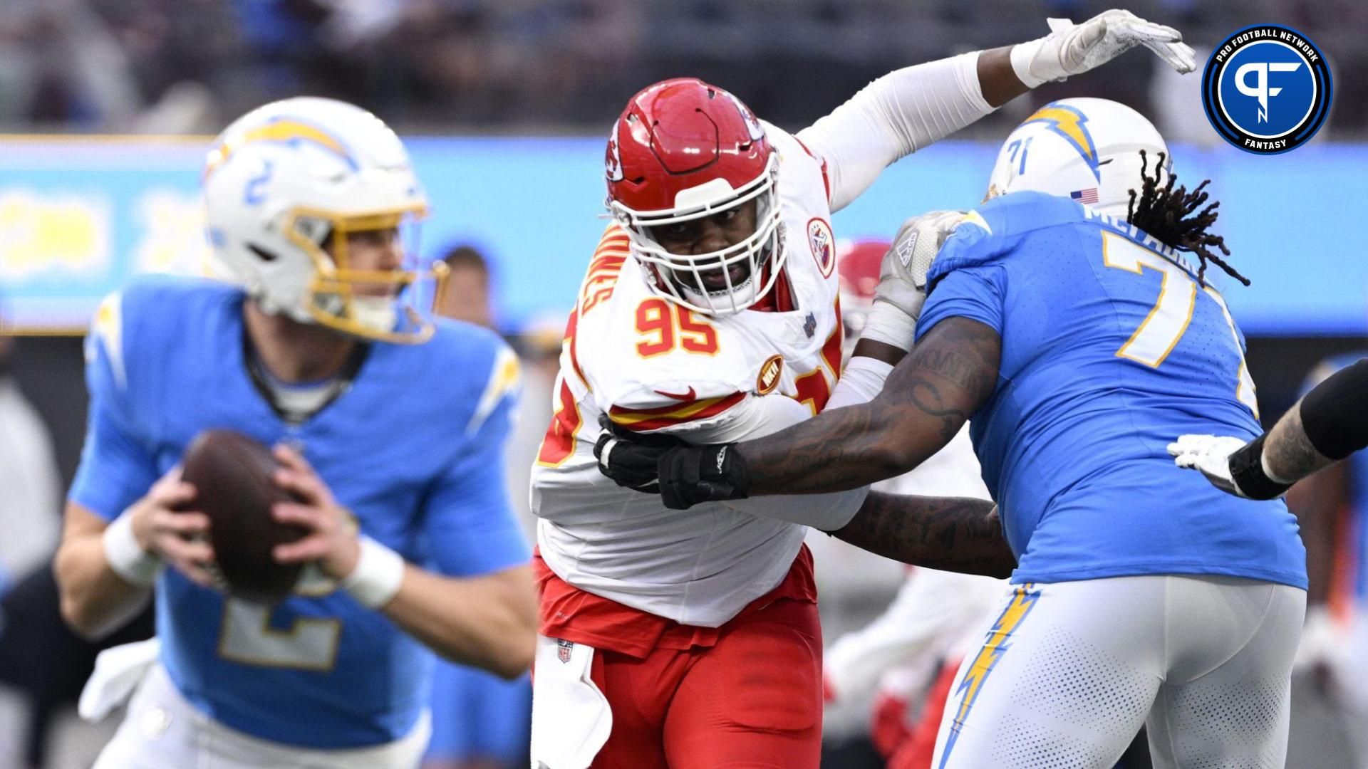 Kansas City Chiefs defensive tackle Chris Jones (95) is blocked by Los Angeles Chargers guard Jordan McFadden (71) during the first half at SoFi Stadium.