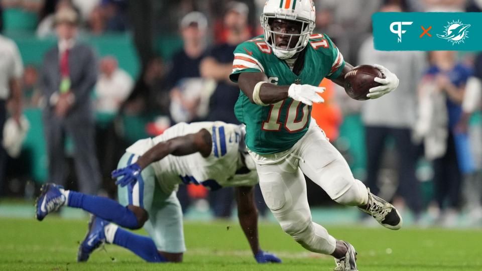 Miami Dolphins WR Tyreek Hill (10) runs after the catch against the Dallas Cowboys.