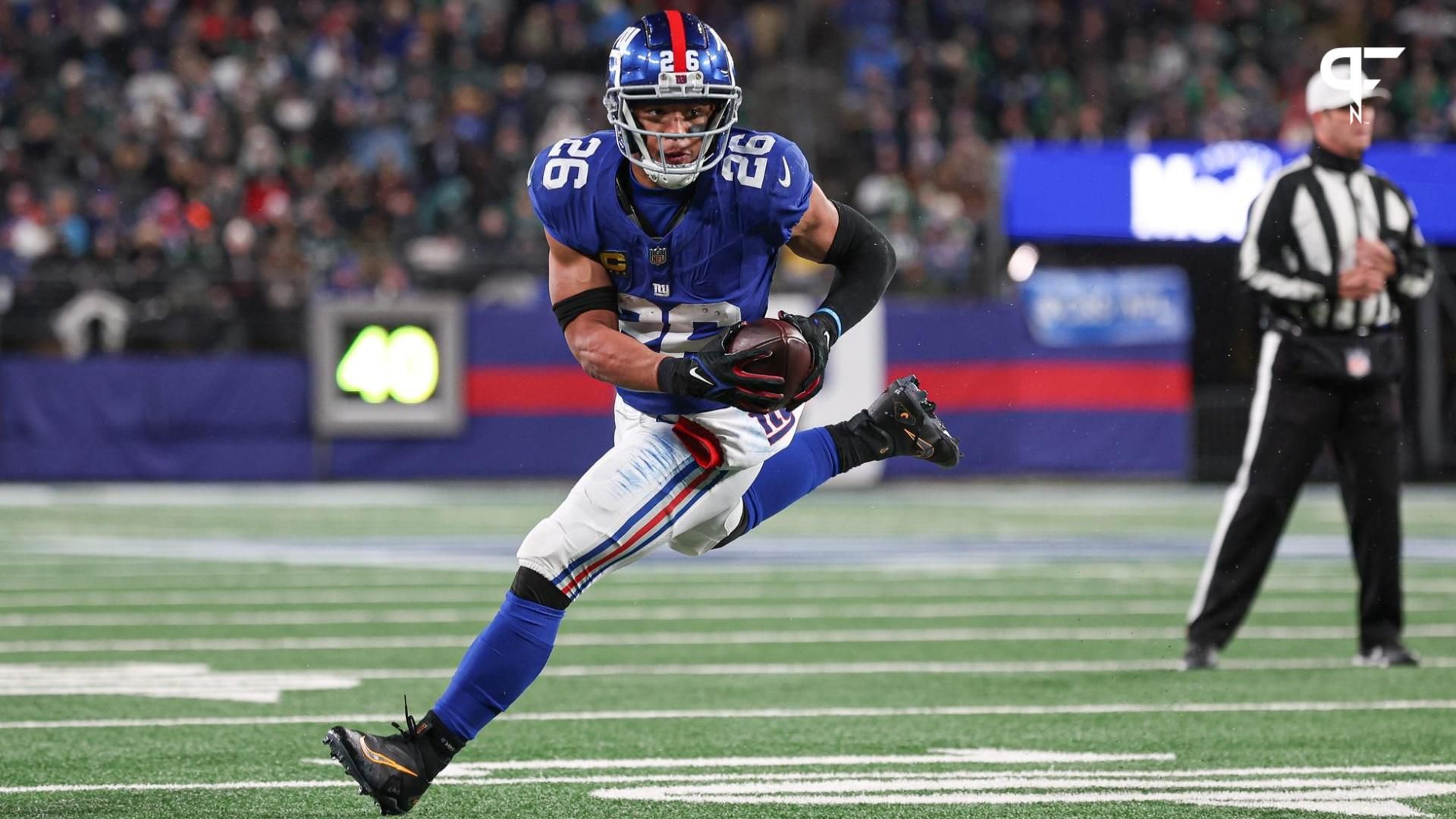 New York Giants RB Saquon Barkley (26) runs for a touchdown against the Philadelphia Eagles.