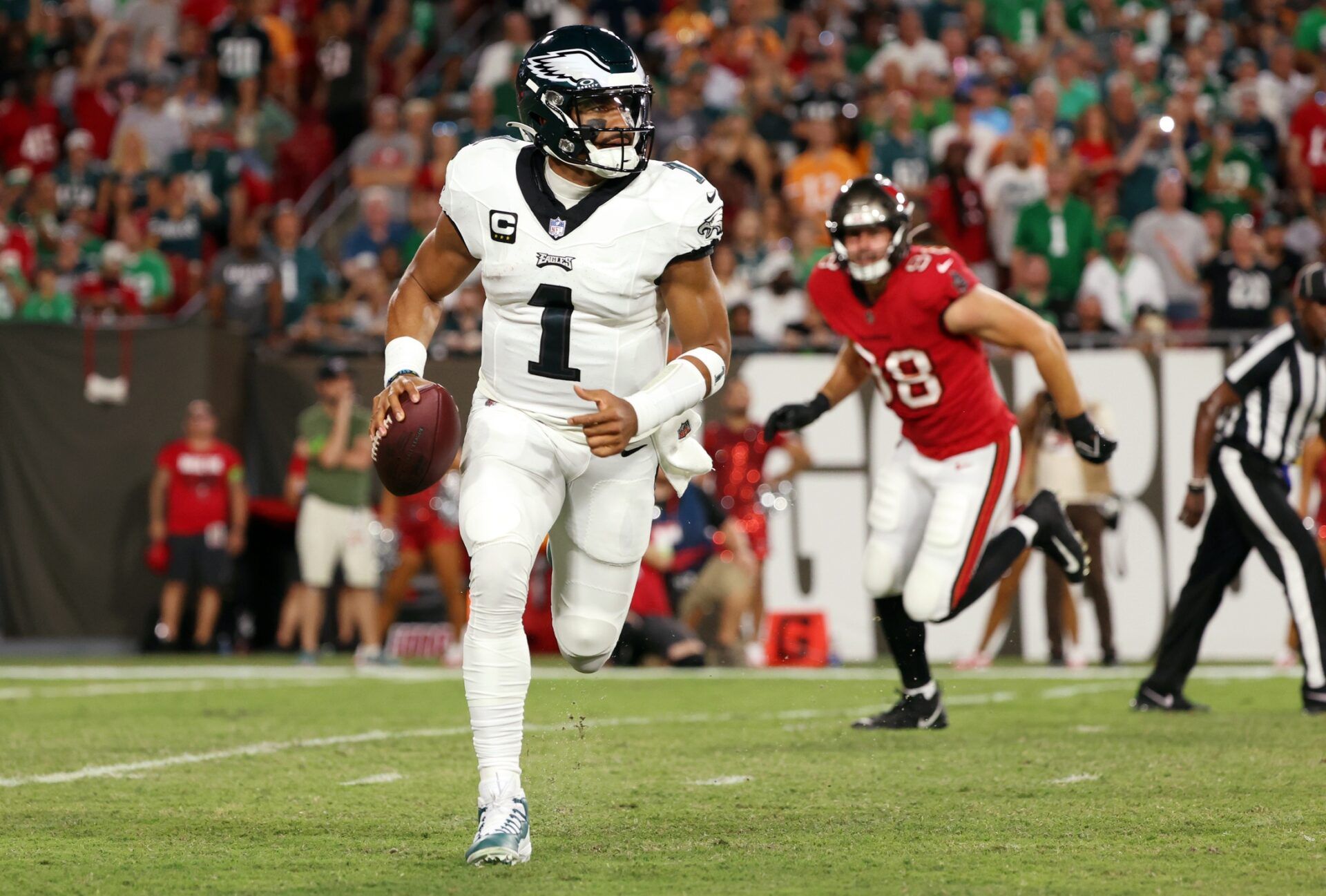 Philadelphia Eagles QB Jalen Hurts (1) rolls out on a play against the Tampa Bay Buccaneers.