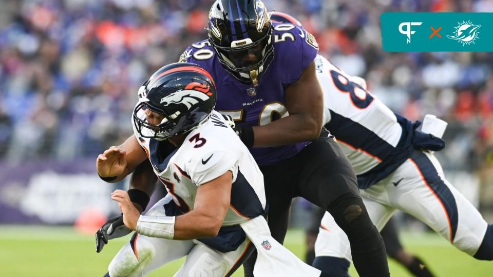 Baltimore Ravens LB Justin Houston (50) hits Denver Broncos QB Russell Wilson (3).