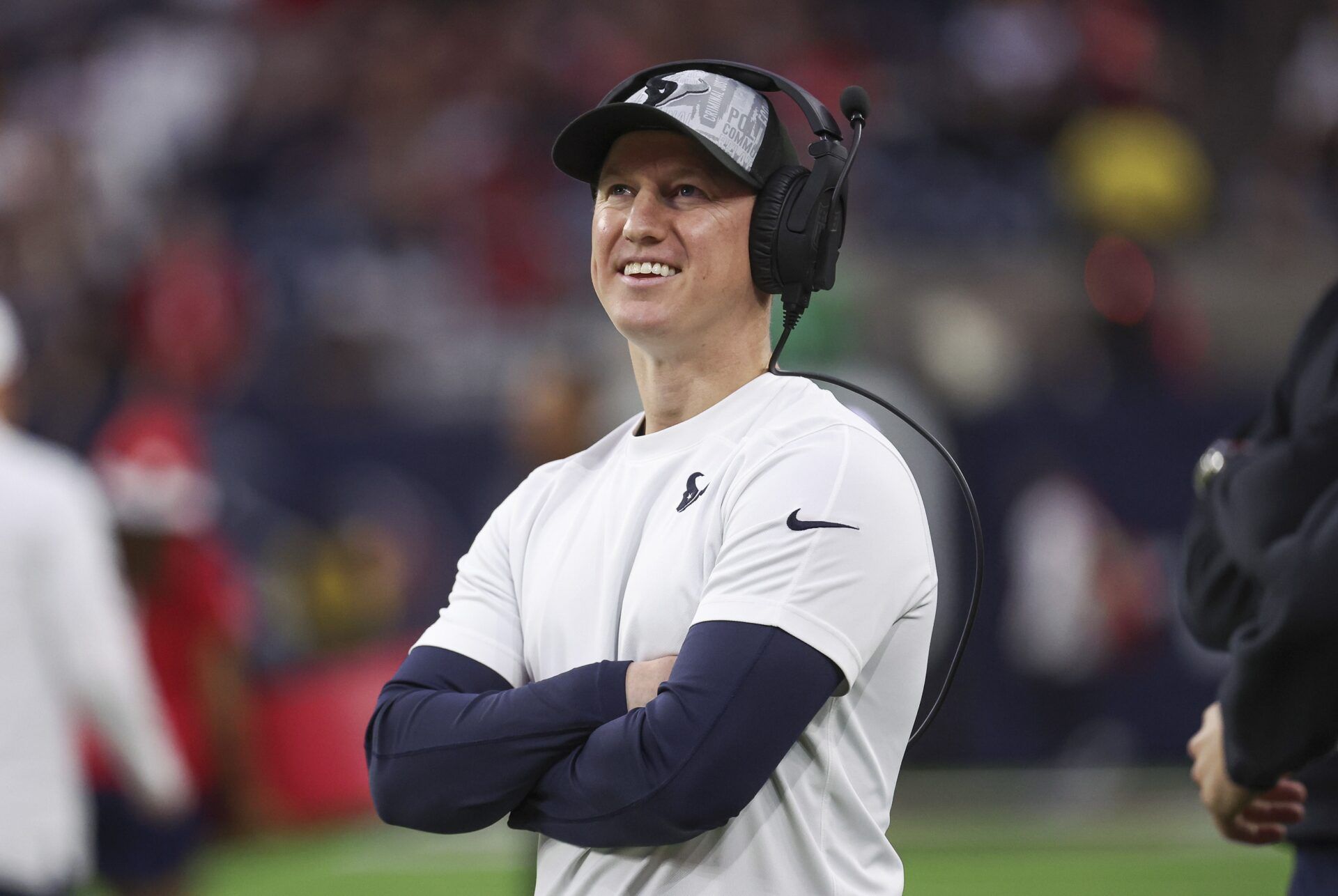 Houston Texans offensive coordinator Bobby Slowik smiles before the game against the Cleveland Browns.