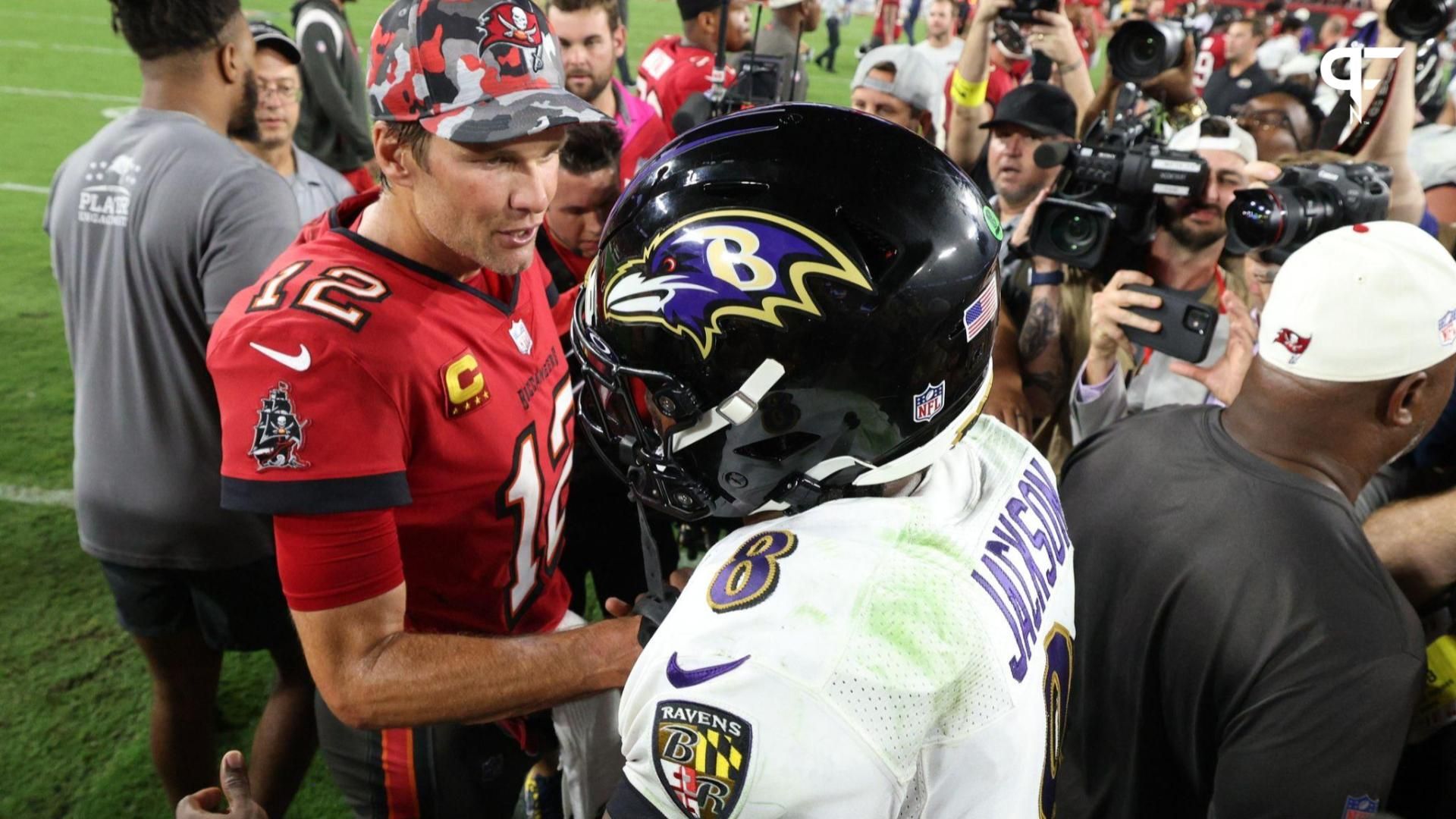 Tampa Bay Buccaneers quarterback Tom Brady (12) greets Baltimore Ravens quarterback Lamar Jackson (8) after a game at Raymond James Stadium.