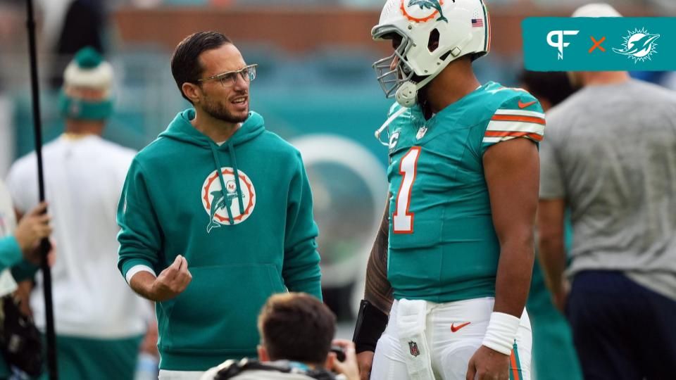 Miami Dolphins head coach Mike McDaniel talks with quarterback Tua Tagovailoa (1) prior to the game against the Dallas Cowboys at Hard Rock Stadium.