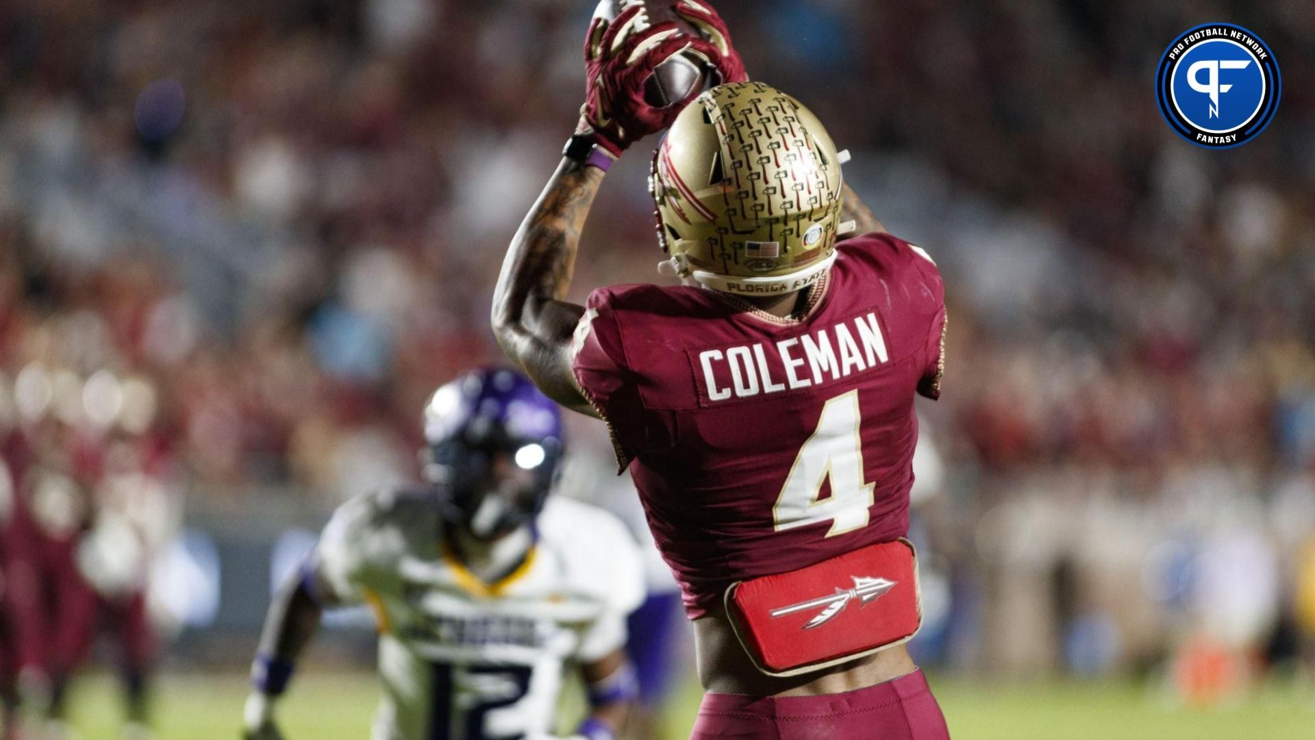 Florida State Seminoles wide receiver Keon Coleman (4) catches a ball in the endzone to score a touchdown against the North Alabama Lions during the third quarter at Doak S. Campbell Stadium.