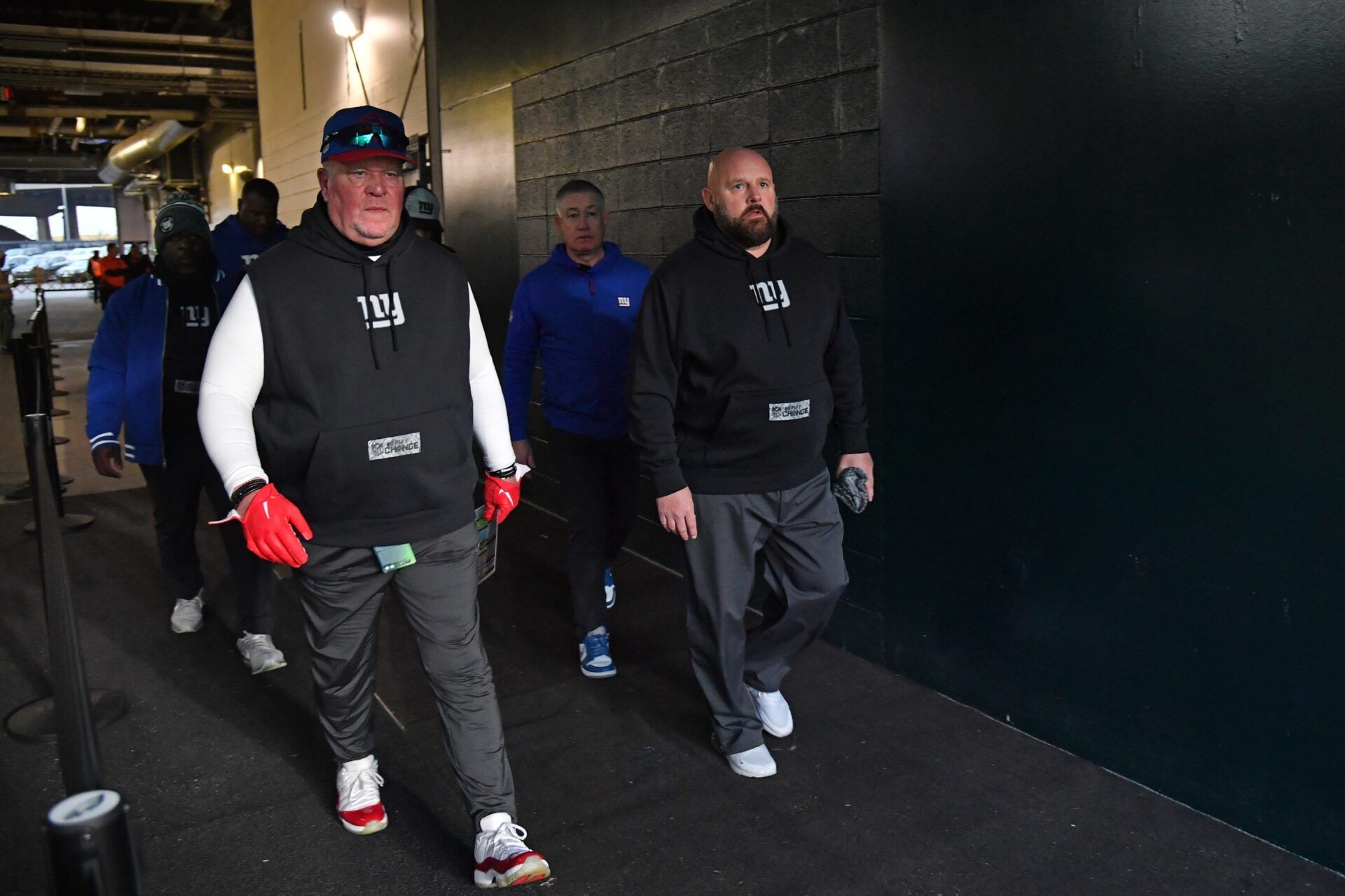 New York Giants defensive coordinator Don ÒWinkÓ Martindale and head coach Brian Daboll walk to the field against the Philadelphia Eagles at Lincoln Financial Field.