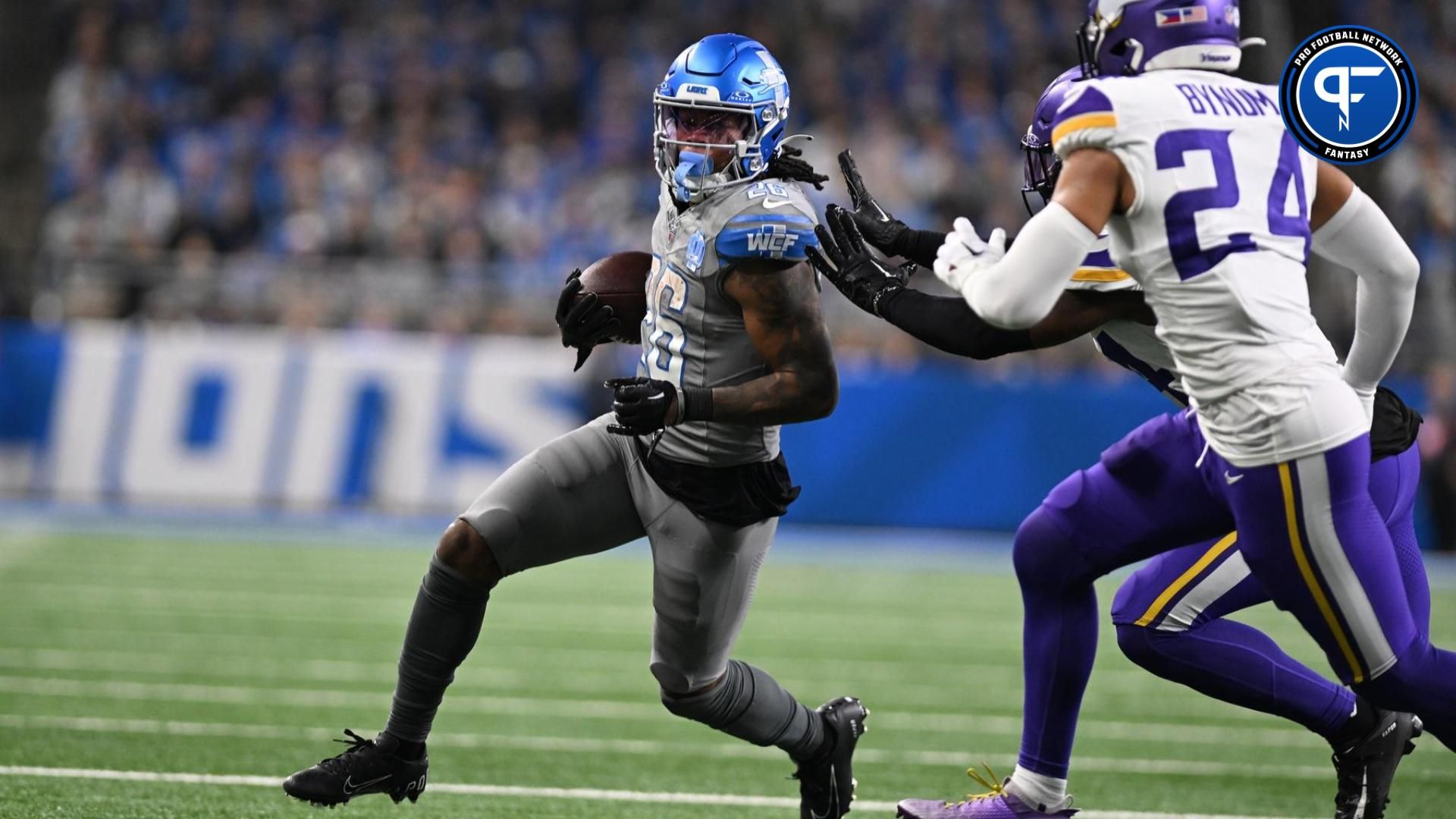 Detroit Lions RB Jahmyr Gibbs (26) runs the ball against the Minnesota Vikings.