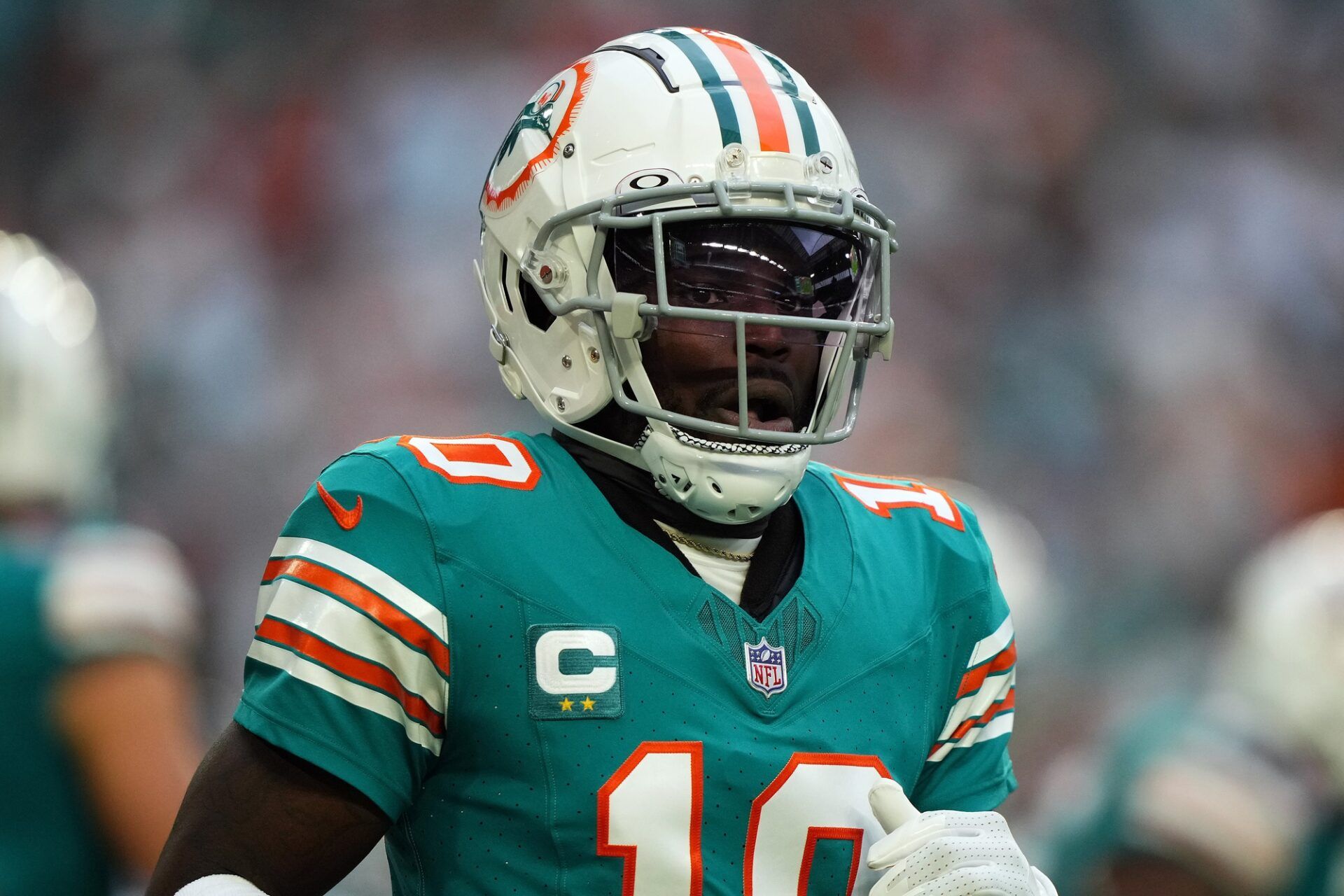 Miami Dolphins wide receiver Tyreek Hill (10) takes his position on the field during the first half against the Dallas Cowboys at Hard Rock Stadium.