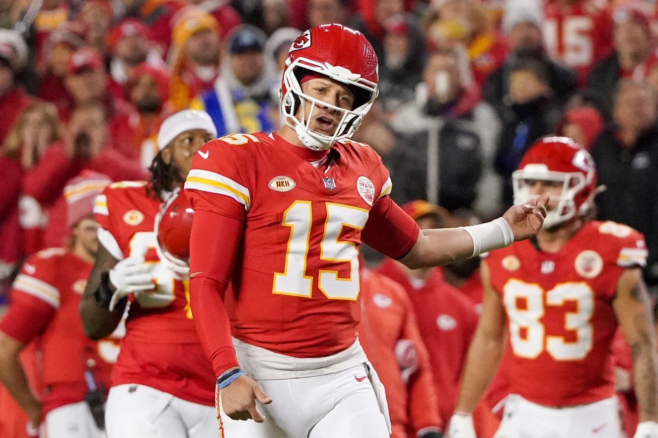 Kansas City Chiefs quarterback Patrick Mahomes (15) gestures to an official after a play against the Buffalo Bills during the second half at GEHA Field at Arrowhead Stadium.