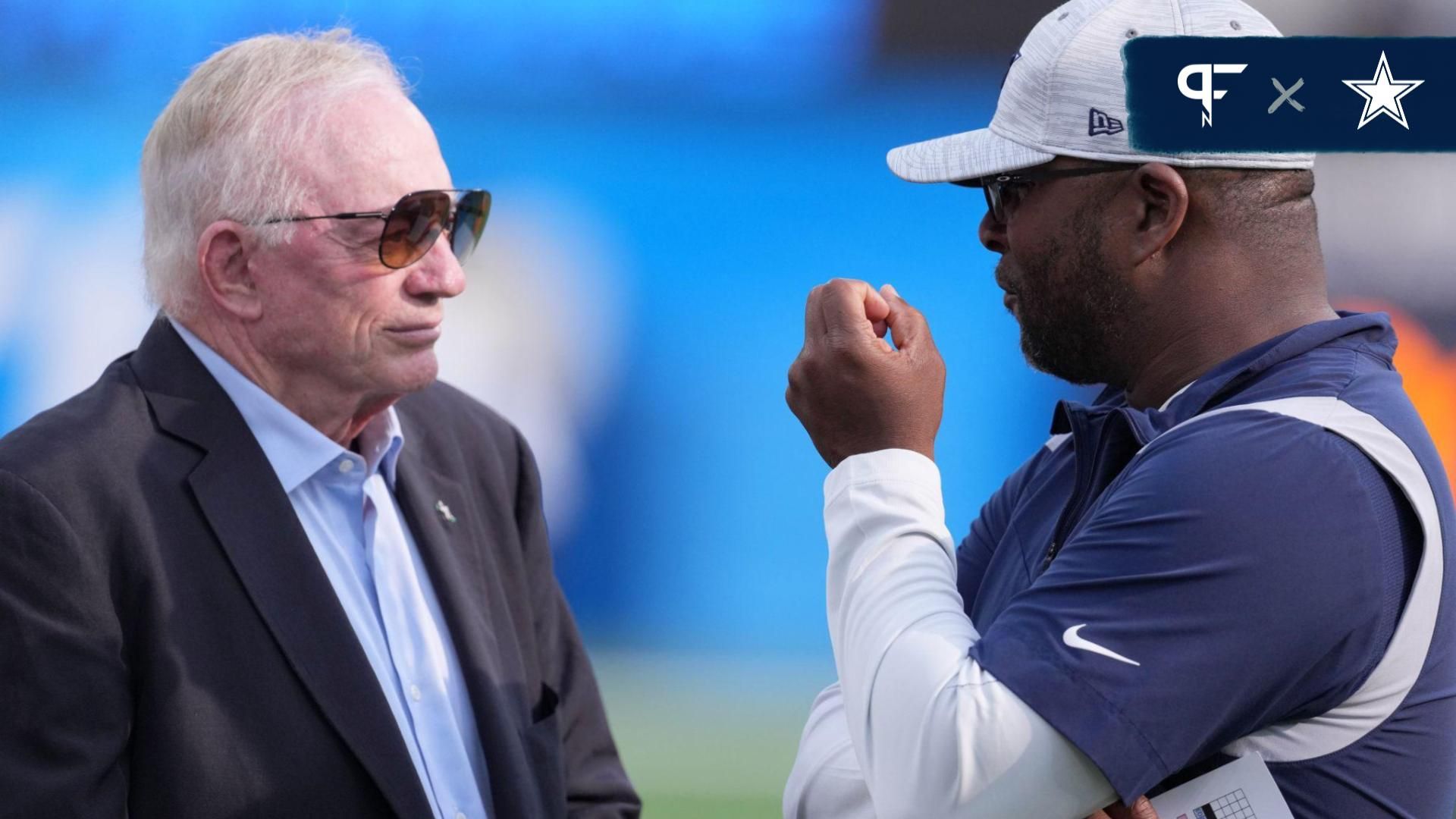 Dallas Cowboys owner Jerry Jones (left) talks with vice president of player personnel Will McClay before the game against the Los Angeles Chargers at SoFi Stadium.