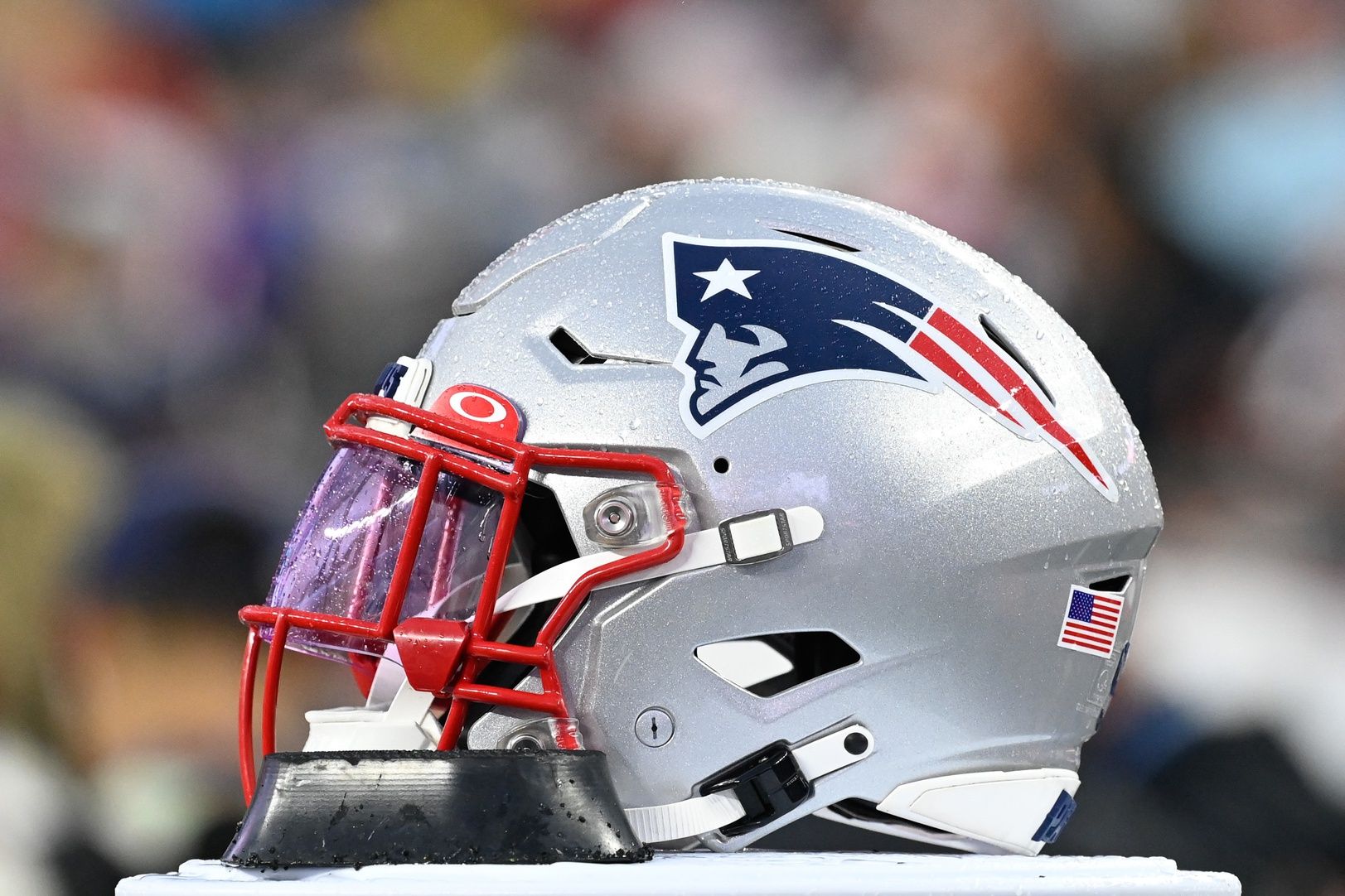 A New England Patriots helmet sits on the sideline during the first half against the Houston Texans at Gillette Stadium.