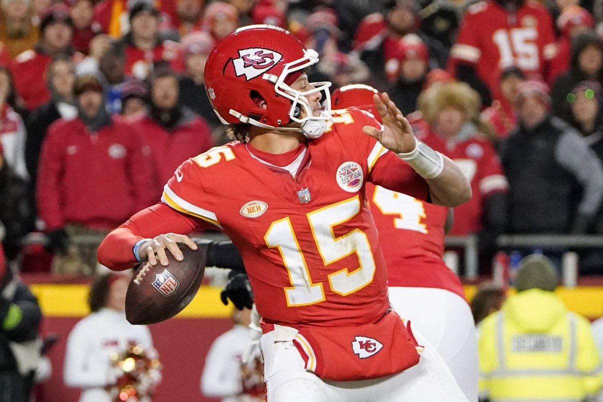 Kansas City Chiefs quarterback Patrick Mahomes (15) throws a pass against the Cincinnati Bengals during the second half at GEHA Field at Arrowhead Stadium.