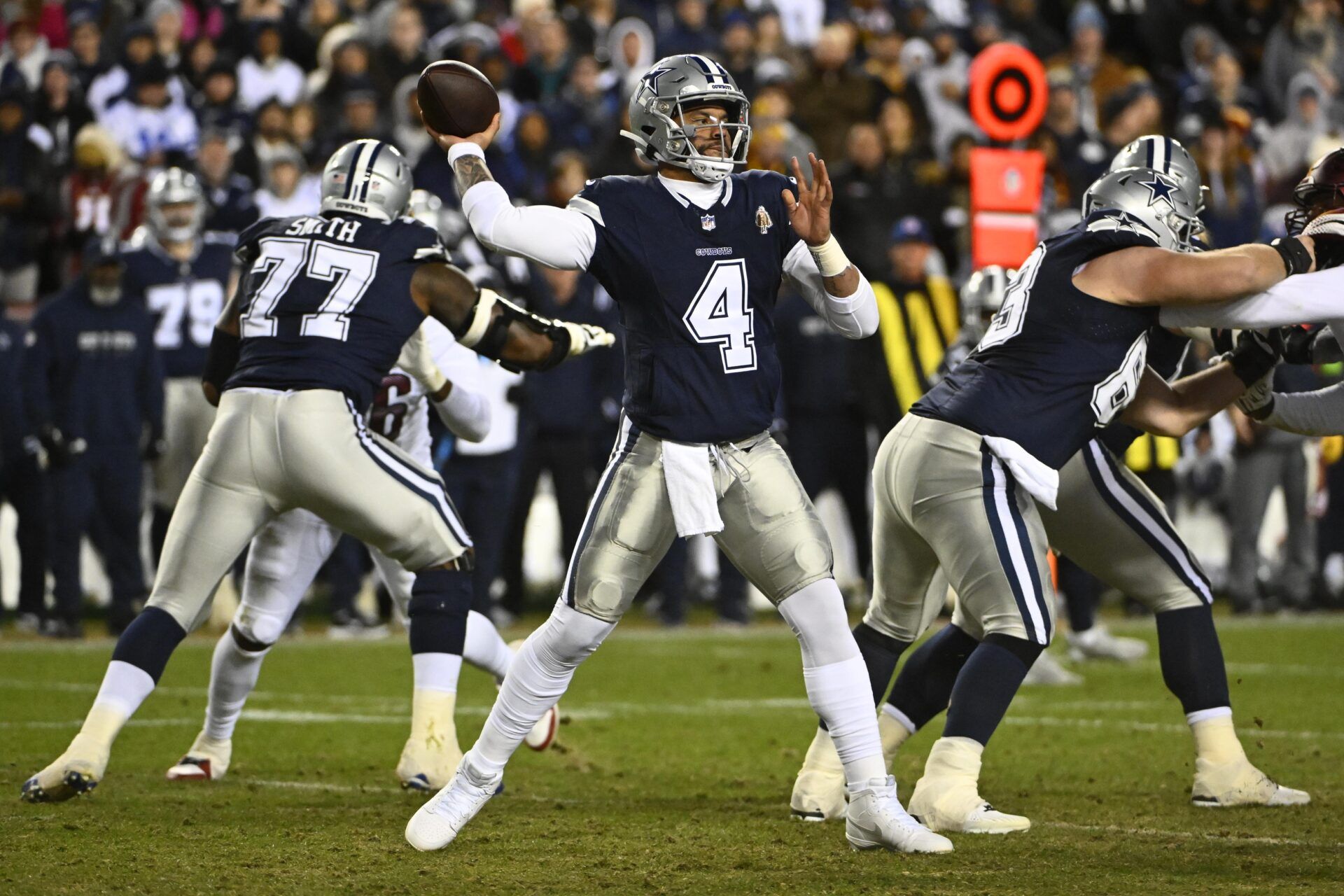 Dallas Cowboys quarterback Dak Prescott (4) attempts a pass against the Washington Commanders during the first half at FedExField.