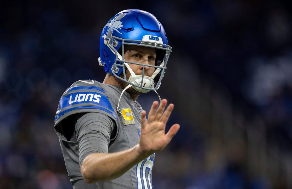 Detroit Lions quarterback Jared Goff waves during pregame warmups before the start of the game against the Minnesota Vikings at Ford Field.