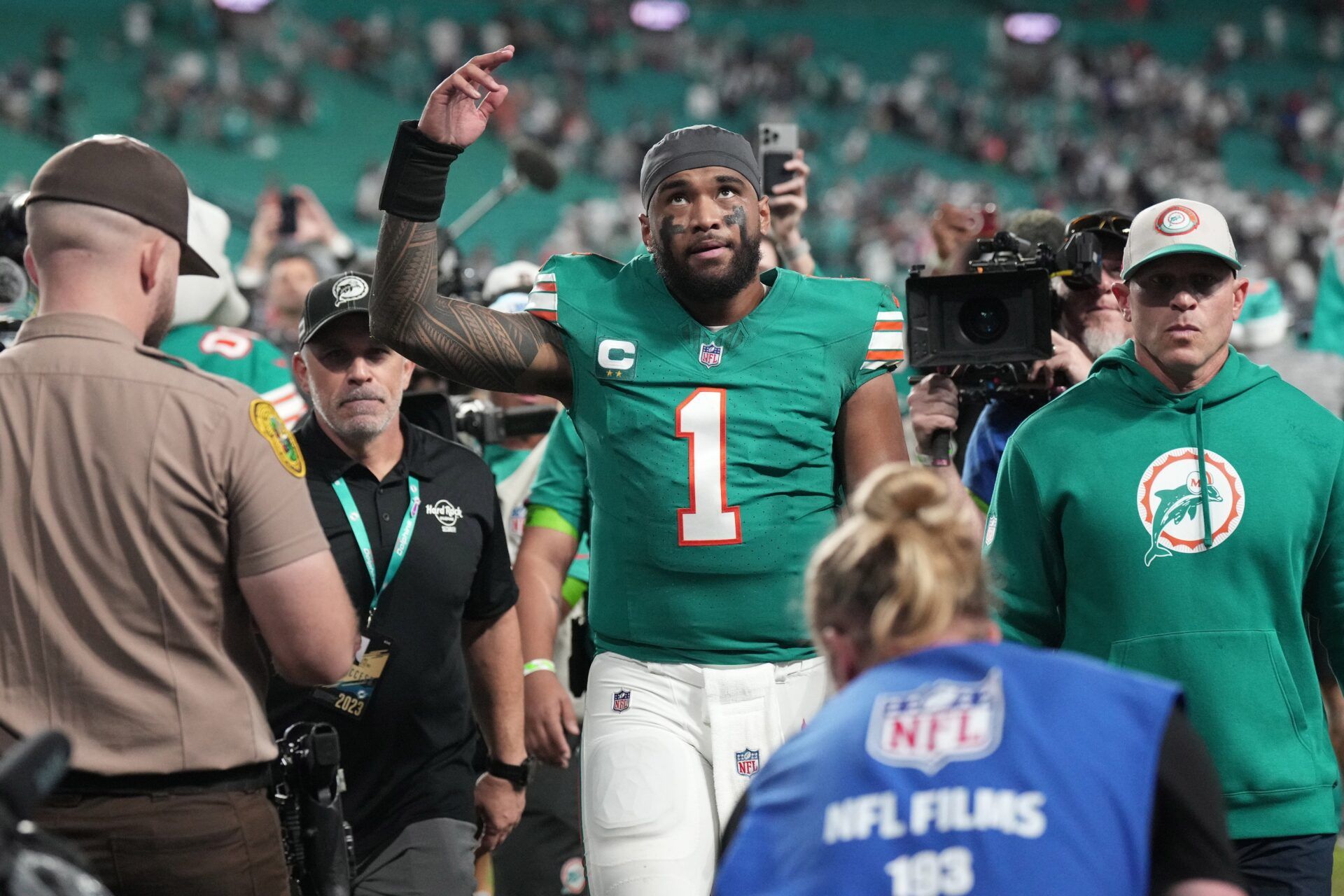 Miami Dolphins quarterback Tua Tagovailoa (1) walks off the field following a victory over Dallas Cowboys