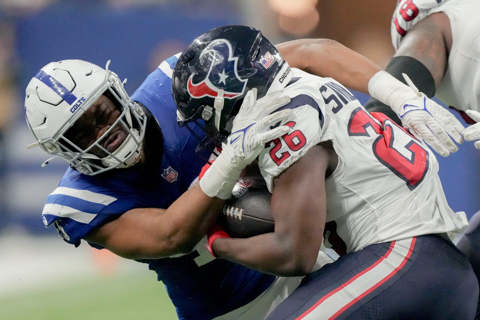 Indianapolis Colts linebacker E.J. Speed (45) works to bring down Houston Texans running back Devin Singletary