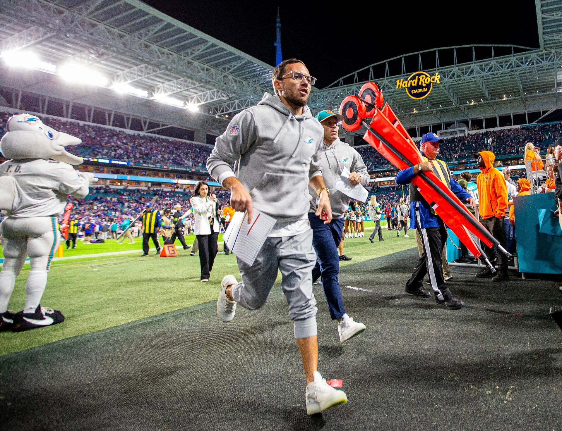 Miami Dolphins head coach Mike McDaniel runs off the field following a defeat at the hands of their conference rivals the Buffalo Bills