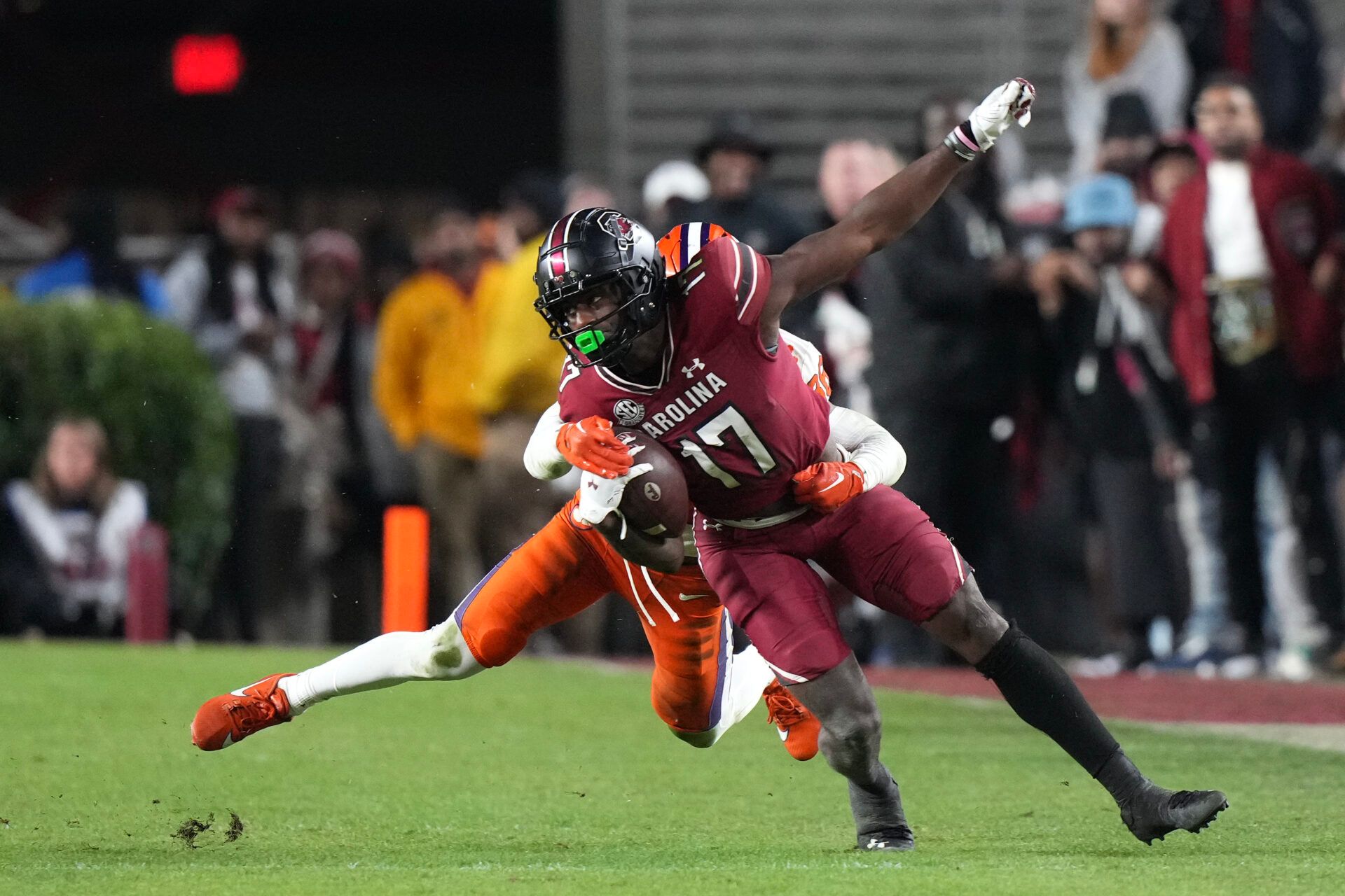 South Carolina Gamecocks wide receiver Xavier Legette (17) is tackled by Clemson Tigers safety Khalil Barnes (36) in the second half at Williams-Brice Stadium.