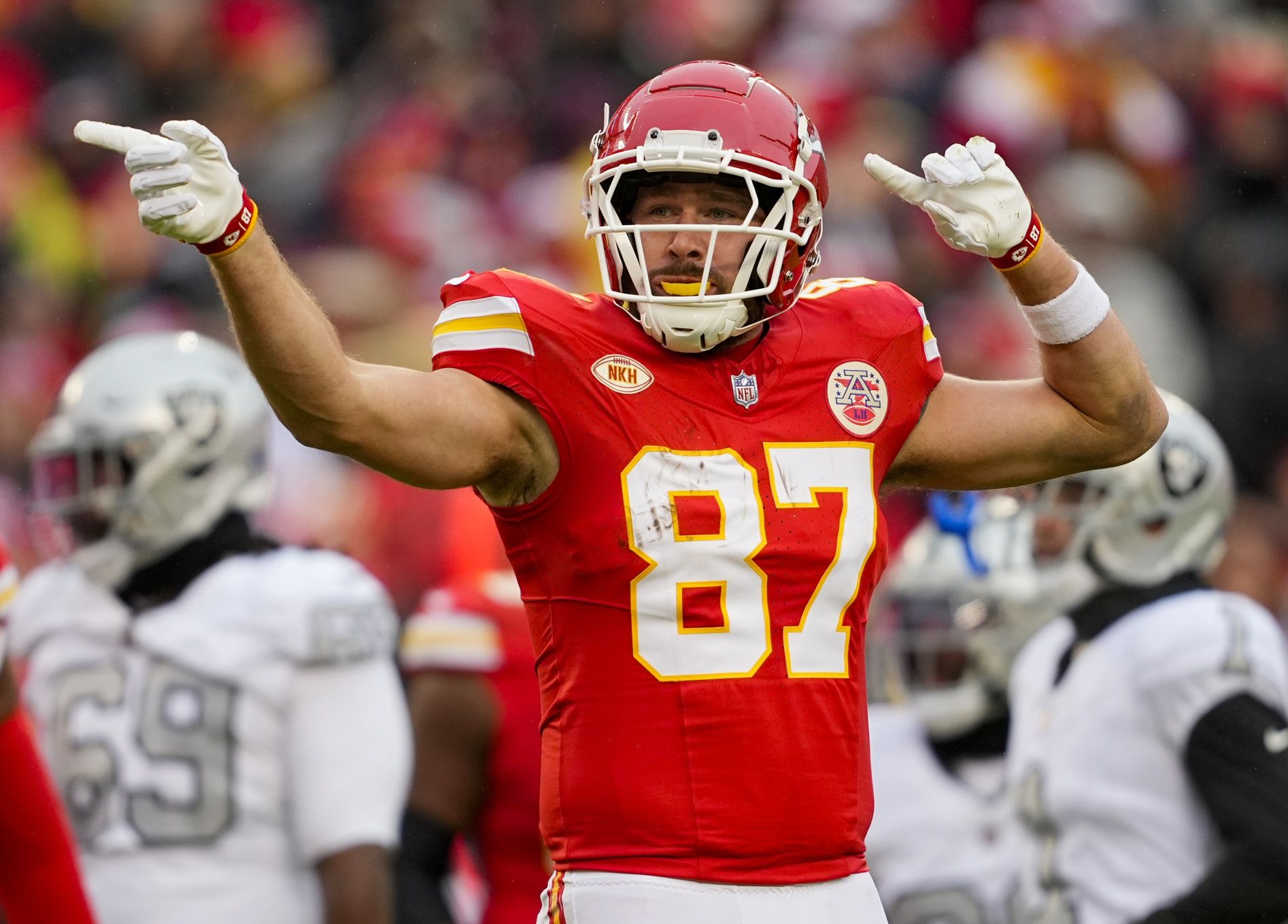 Kansas City Chiefs tight end Travis Kelce (87) celebrates during the first half against the Las Vegas Raiders at GEHA Field at Arrowhead Stadium.