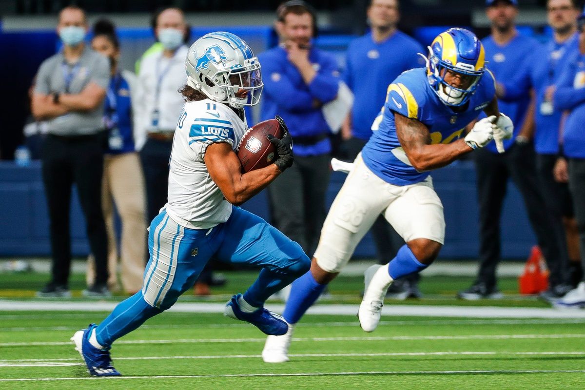 Detroit Lions wide receiver Kalif Raymond (11) runs against Los Angeles Rams after making a catch.