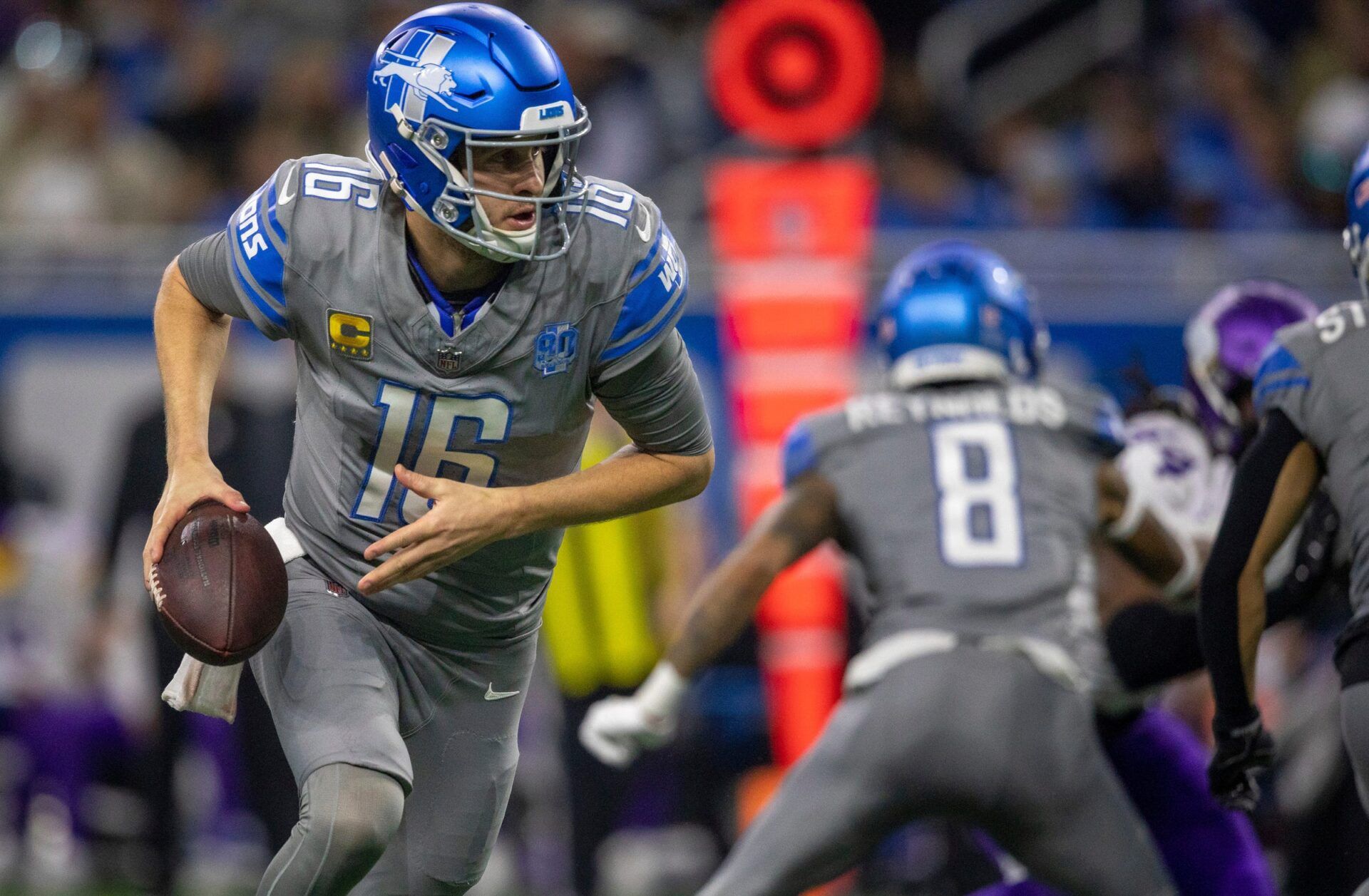 Detroit Lions quarterback Jared Goff scrambles during a play against the Minnesota Vikings at Ford Field in Detroit