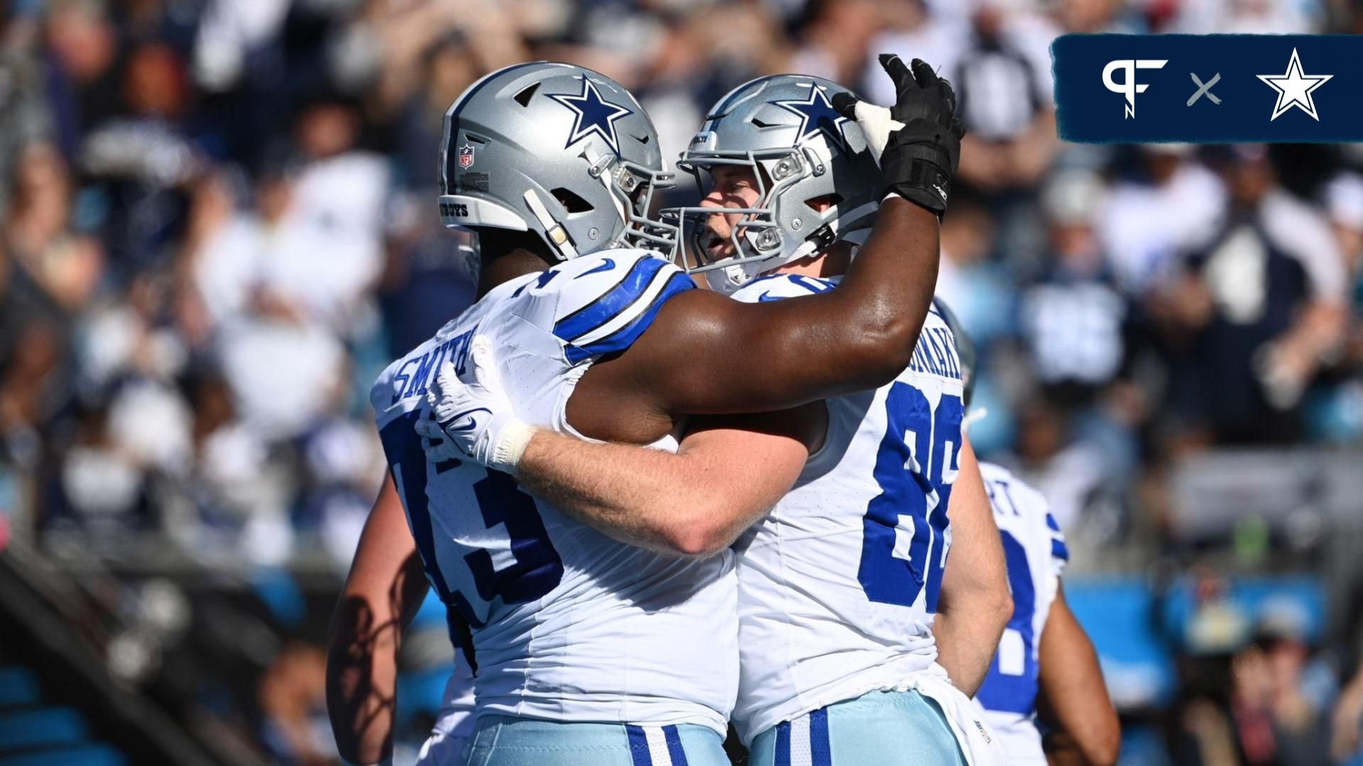 Dallas Cowboys tight end Luke Schoonmaker (86) celebrates with offensive tackle Tyler Smith (73) after scoring a touchdown in the first quarter at Bank of America Stadium.