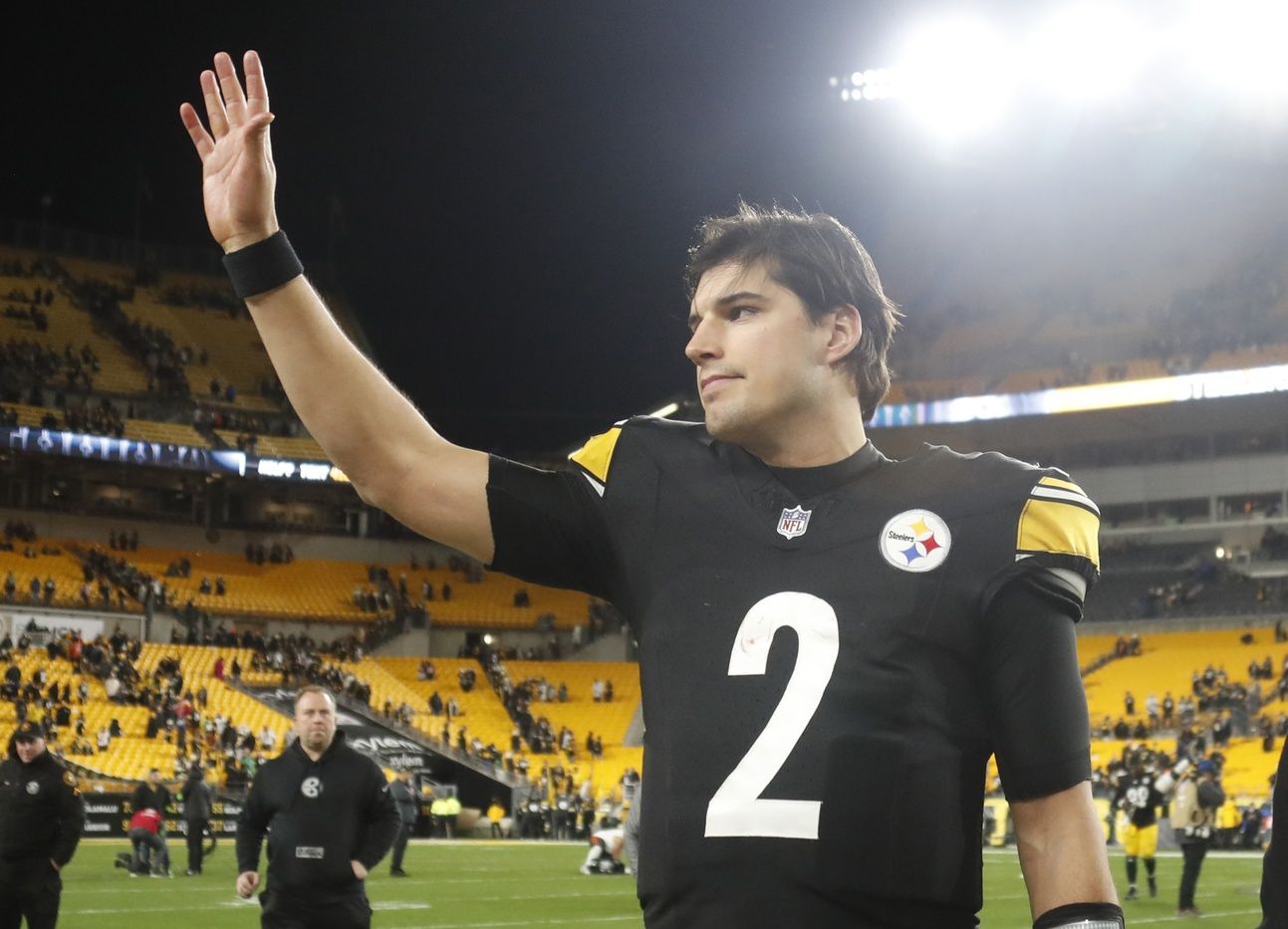 Pittsburgh Steelers quarterback Mason Rudolph (2) waves to the crowd as he leaves the field after defeating the Cincinnati Bengals at Acrisure Stadium.