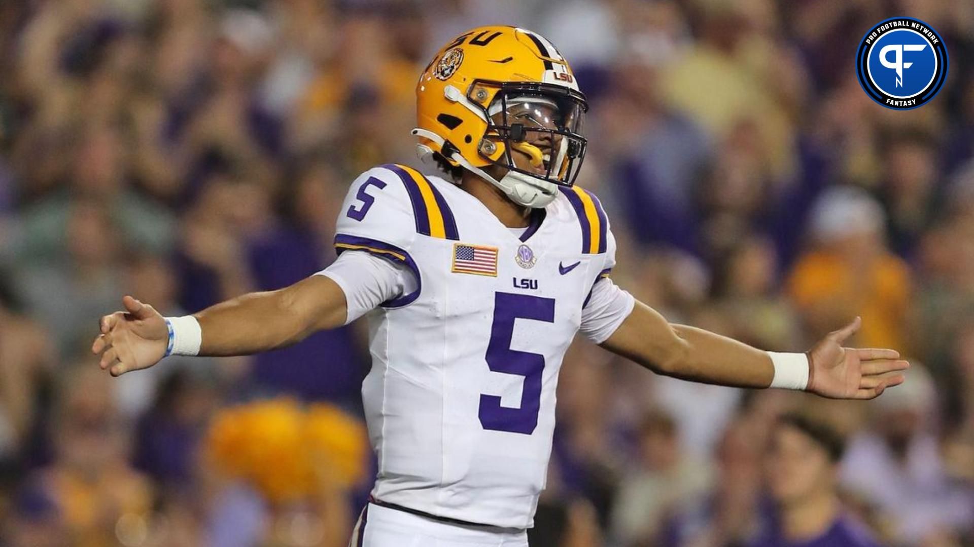 LSU Tigers quarterback Jayden Daniels (5) celebrates a touchdown against the Army Black Knights during the first half at Tiger Stadium.