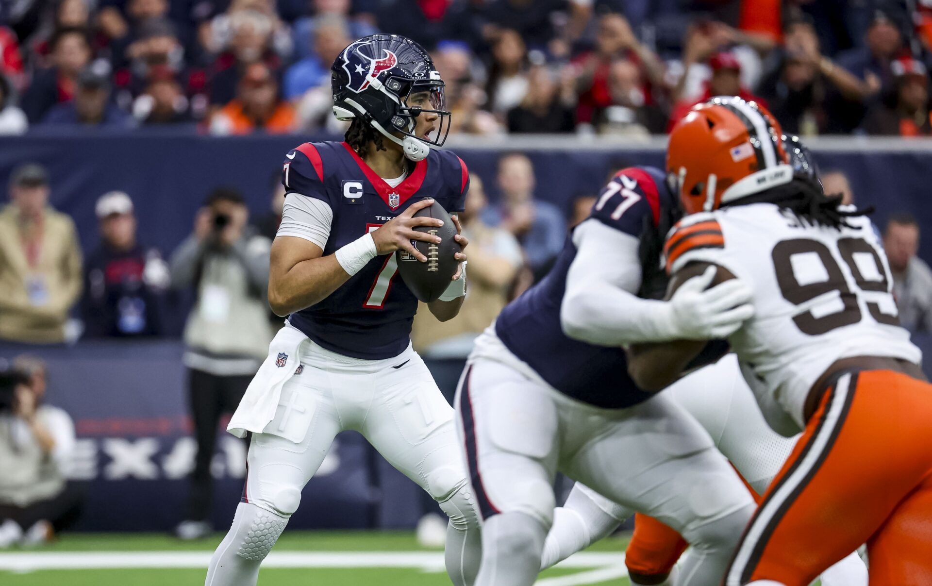 Houston Texans quarterback C.J. Stroud (7) during the first quarter in a 2024 AFC wild card game at NRG Stadium.