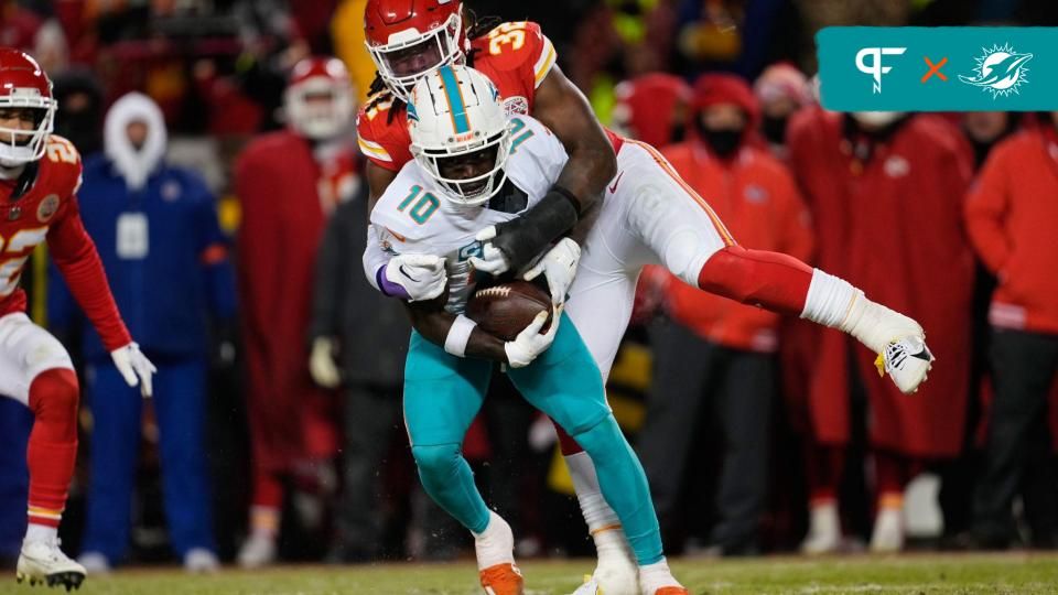 Miami Dolphins wide receiver Tyreek Hill (10) is brought down by Kansas City Chiefs linebacker Nick Bolton (32) during the second half of the 2024 AFC wild card game at GEHA Field at Arrowhead Stadium.