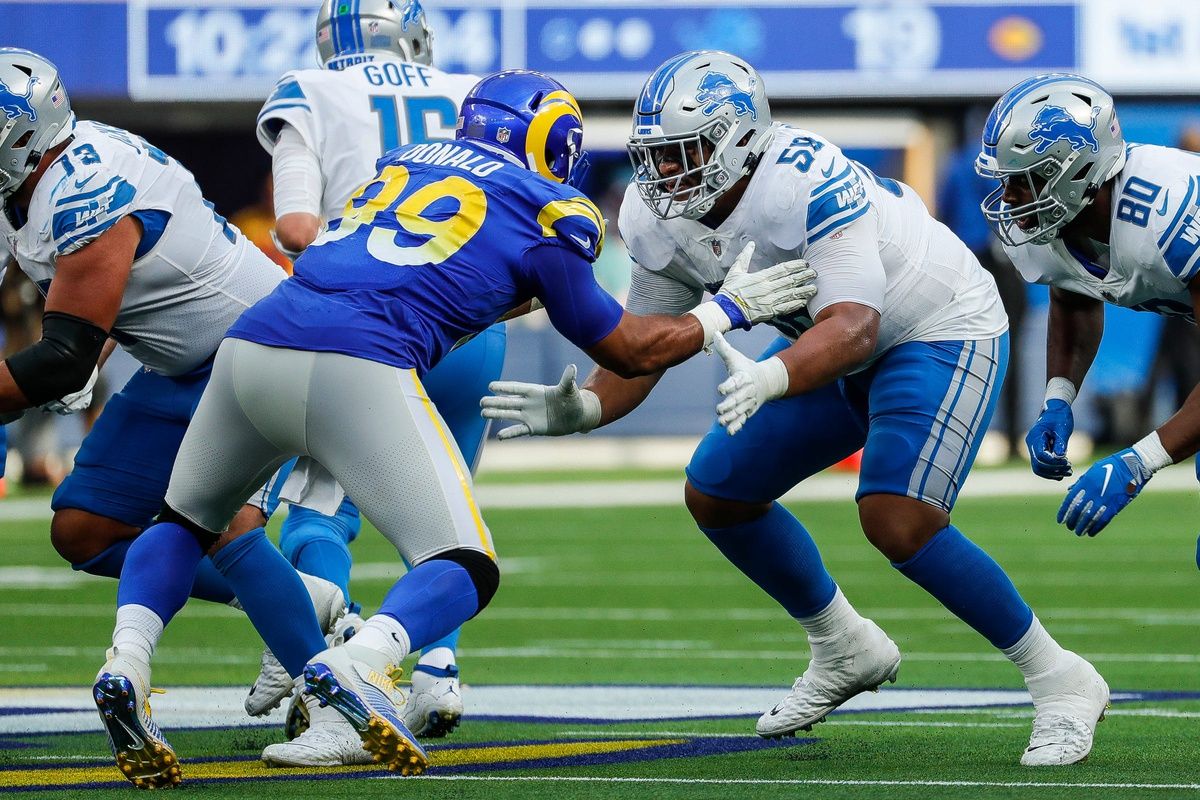 Detroit Lions offensive tackle Penei Sewell sets up to block Los Angeles Rams defensive end Aaron Donald during the second half at SoFi Stadium in Inglewood, Calif. on Sunday, Oct. 24, 2021.