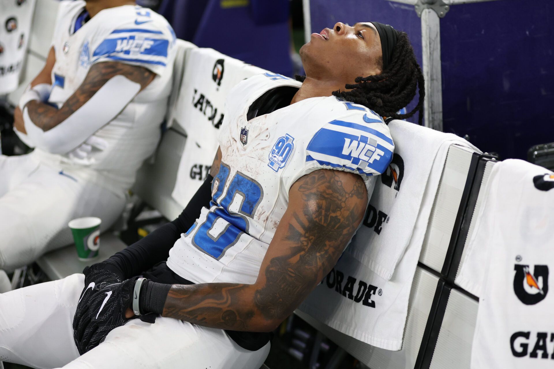 Detroit Lions running back Jahmyr Gibbs (26) sits on the bench after the game against the Dallas Cowboys at AT&T Stadium.