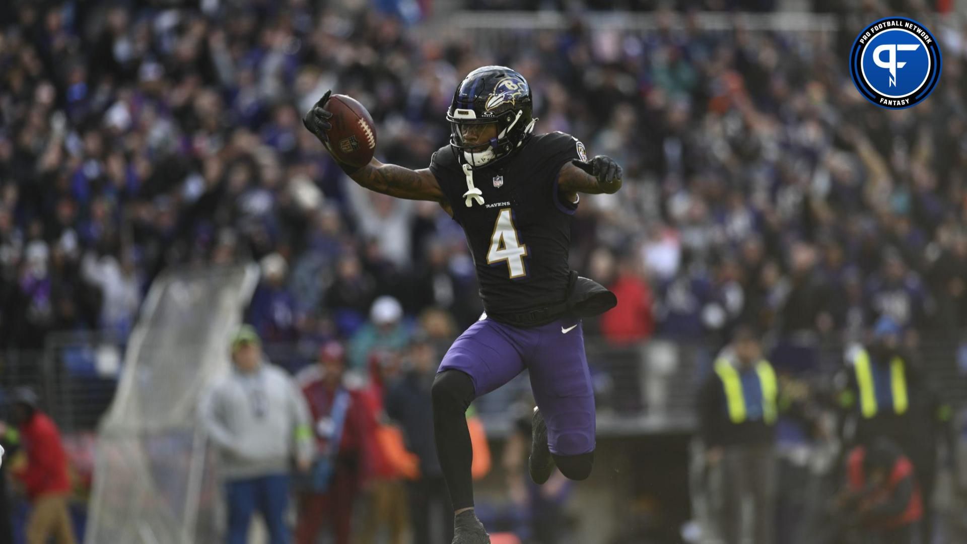 Baltimore Ravens wide receiver Zay Flowers (4) leaps into the endzone for a touchdown during the second quarter against the Miami Dolphins at M&T Bank Stadium.