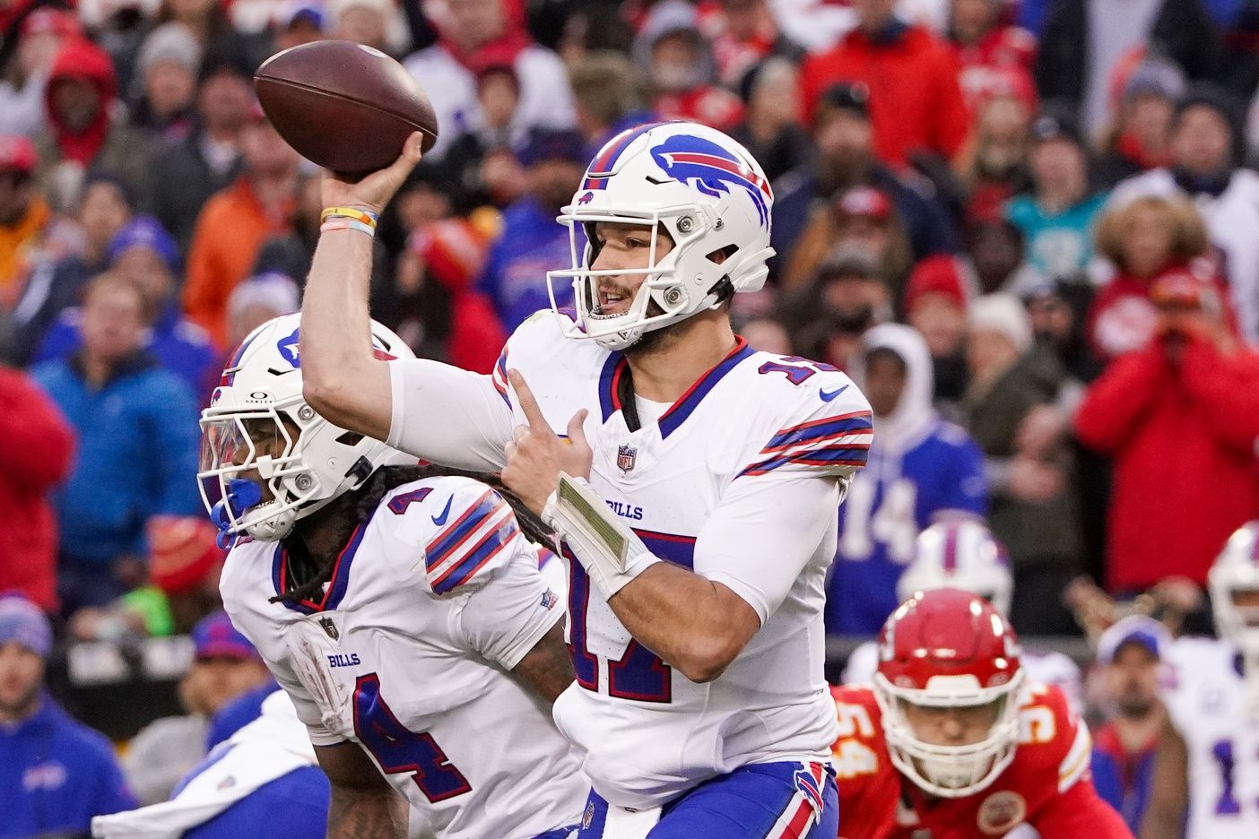 Buffalo Bills quarterback Josh Allen (17) throws a pass against the Kansas City Chiefs during the first half at GEHA Field at Arrowhead Stadium.