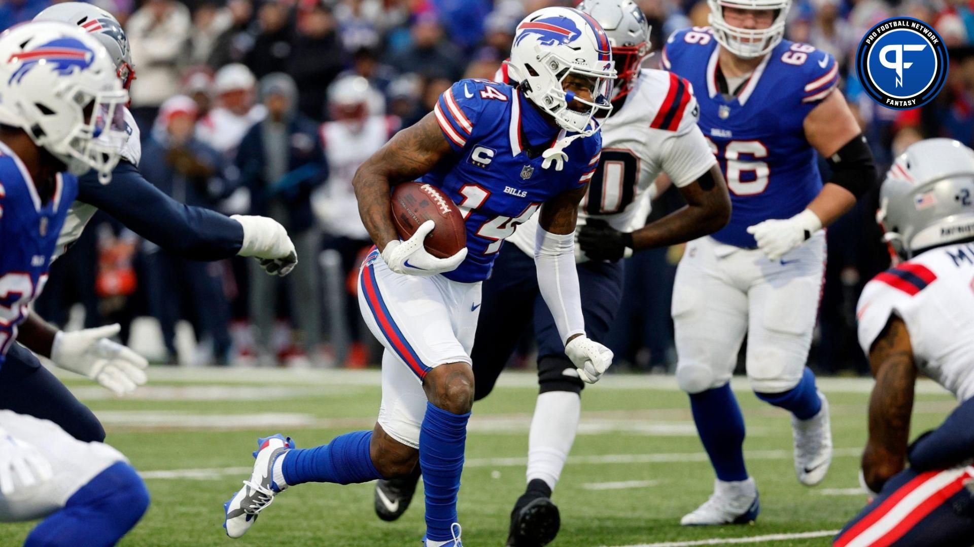 Buffalo Bills wide receiver Stefon Diggs (14) gains yards on the reverse against the Patriots.