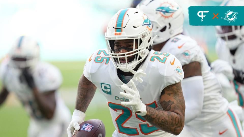 Miami Dolphins cornerback Xavien Howard (25) returns a fumble for a touchdown against the Houston Texans during the first half of an NFL game at Hard Rock Stadium.