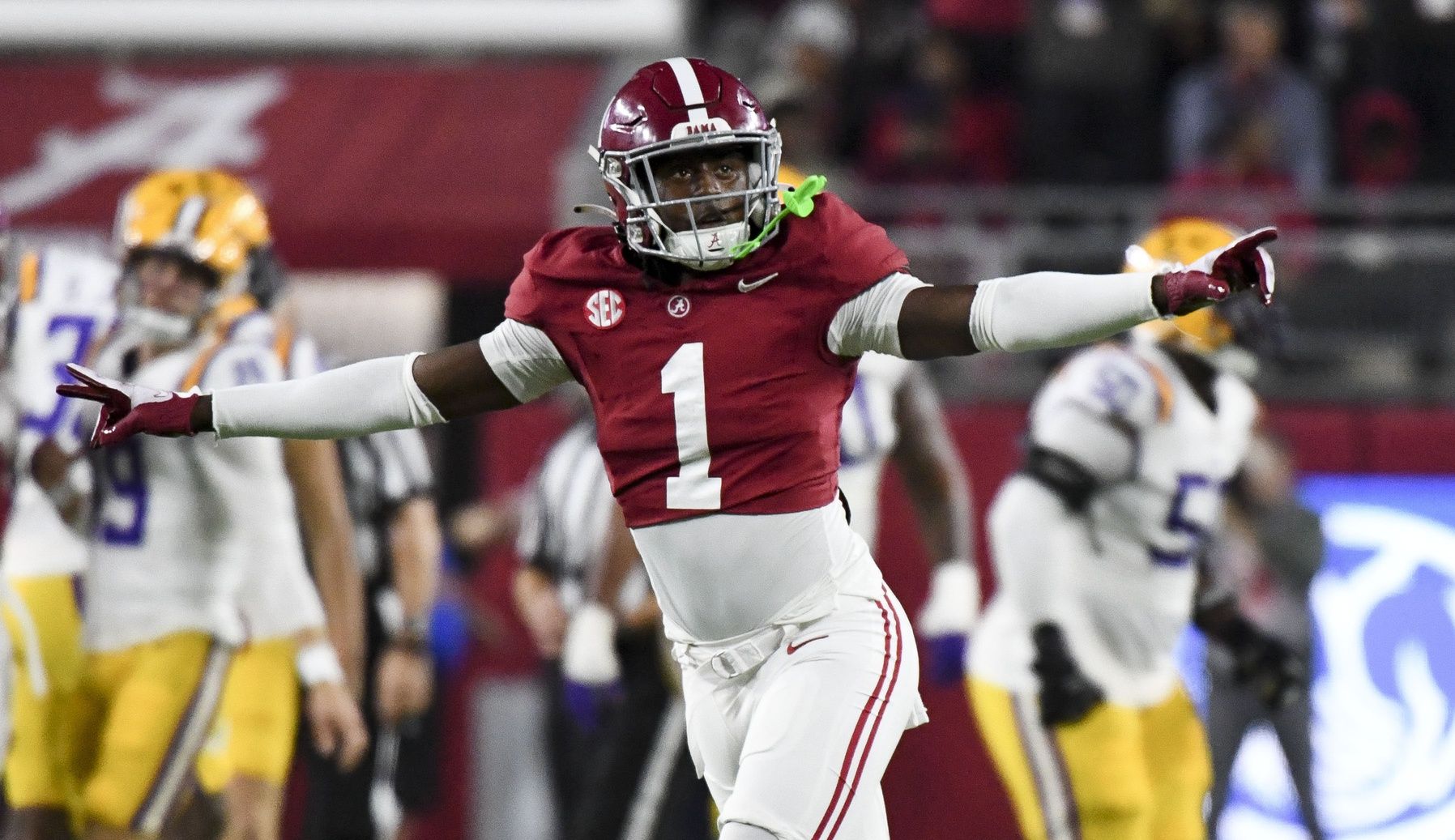 Alabama Crimson Tide DB Kool-Aid McKinstry (1) celebrates after a missed field goal by LSU.