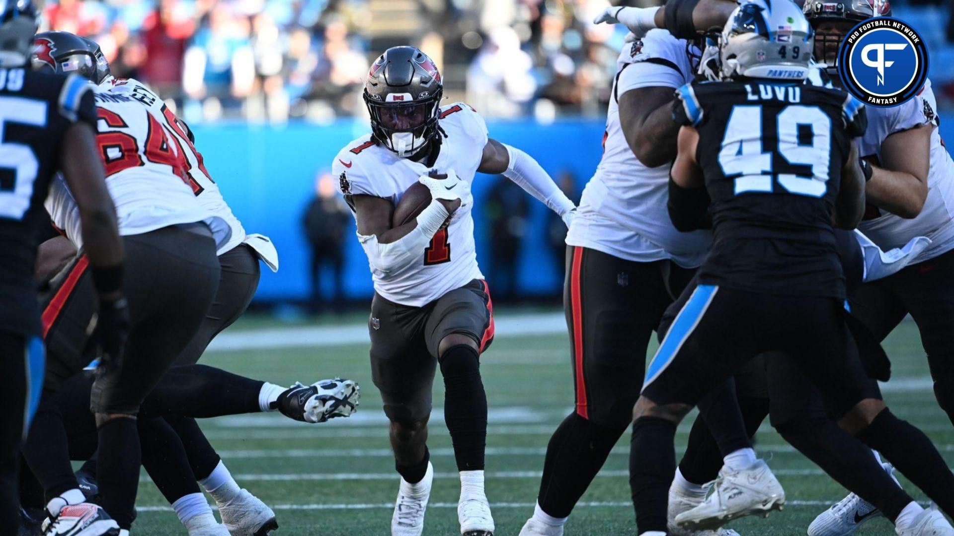 Tampa Bay Buccaneers running back Rachaad White (1) runs in the fourth quarter at Bank of America Stadium.