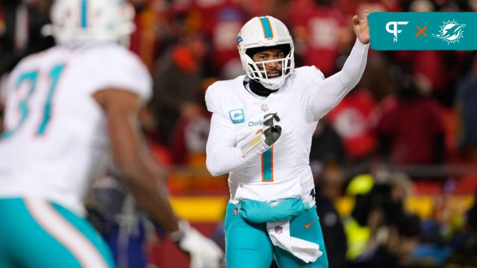 Miami Dolphins quarterback Tua Tagovailoa (1) throws to running back Raheem Mostert (31) against the. Kansas City Chiefs during the second half of the 2024 AFC wild card game at GEHA Field at Arrowhead Stadium.