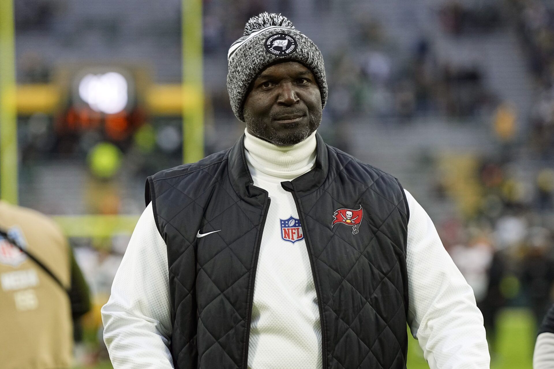 Tampa Bay Buccaneers head coach Todd Bowles walks from the field following the game against the Green Bay Packers at Lambeau Field.