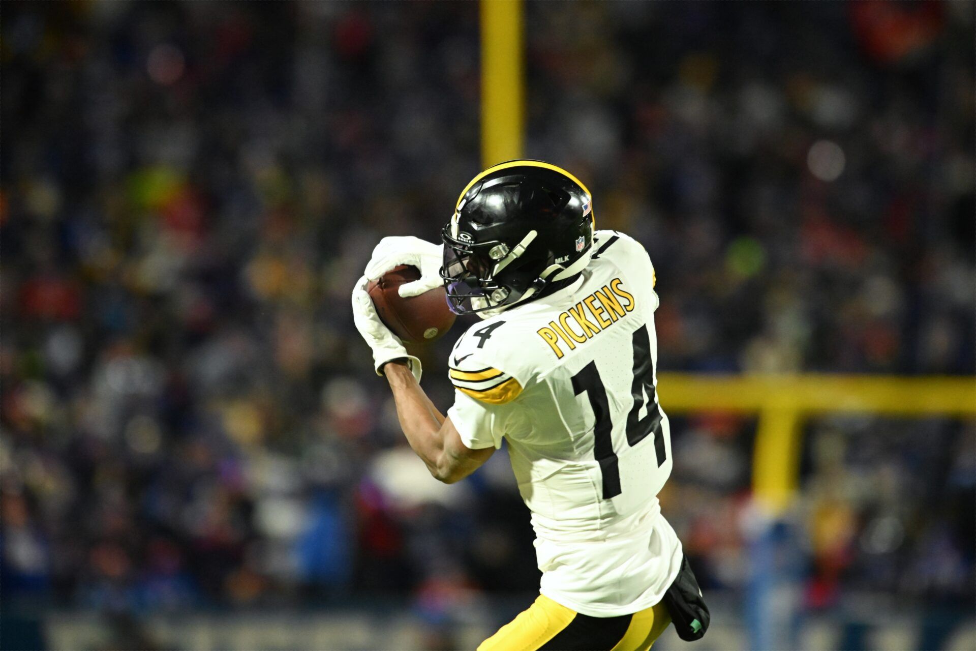 Pittsburgh Steelers wide receiver George Pickens (14) makes a catch in the first half against the Buffalo Bills in a 2024 AFC wild card game at Highmark Stadium.